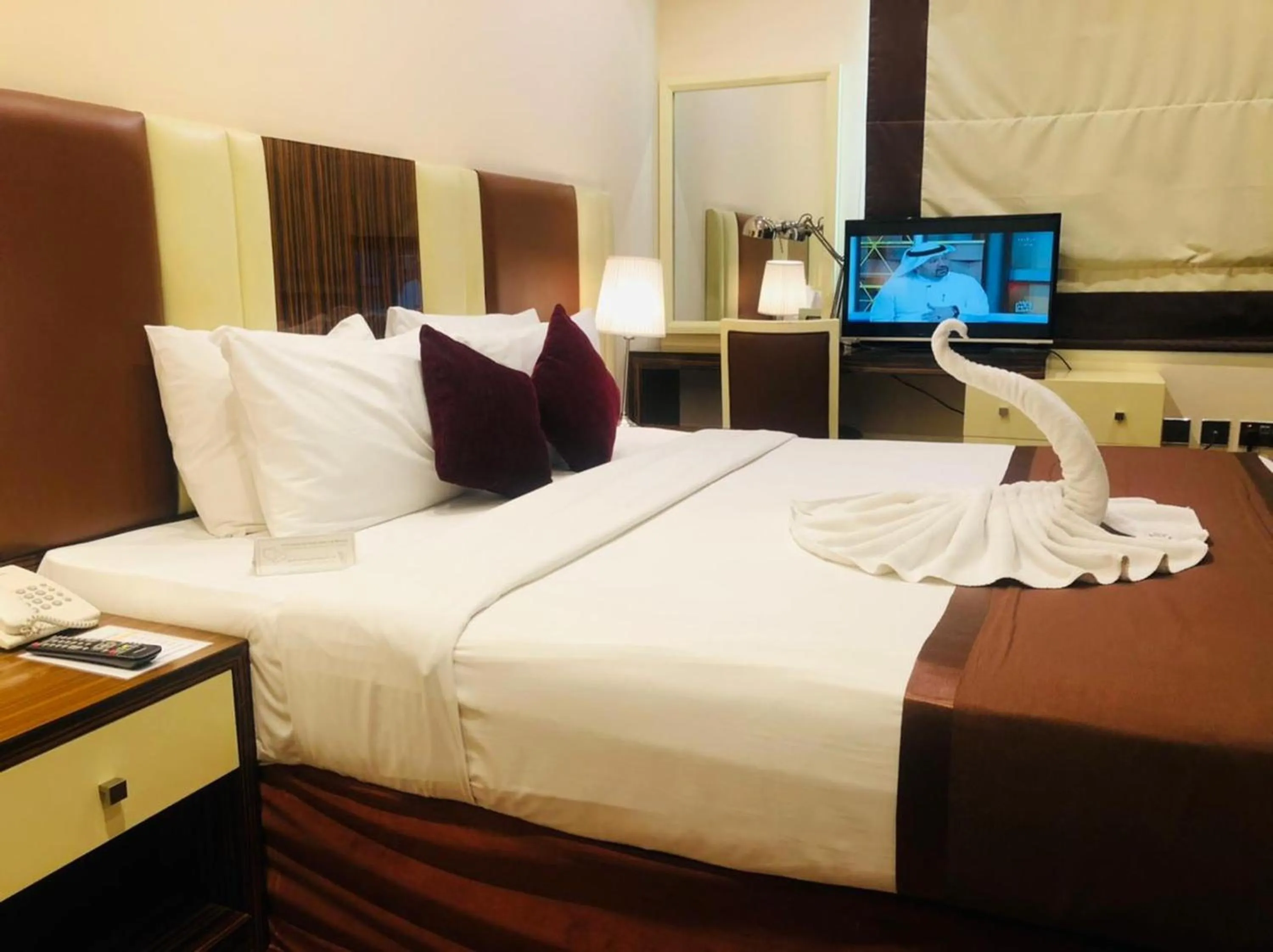 Communal lounge/ TV room, TV/Entertainment Center in The View Al Barsha Hotel Apartments