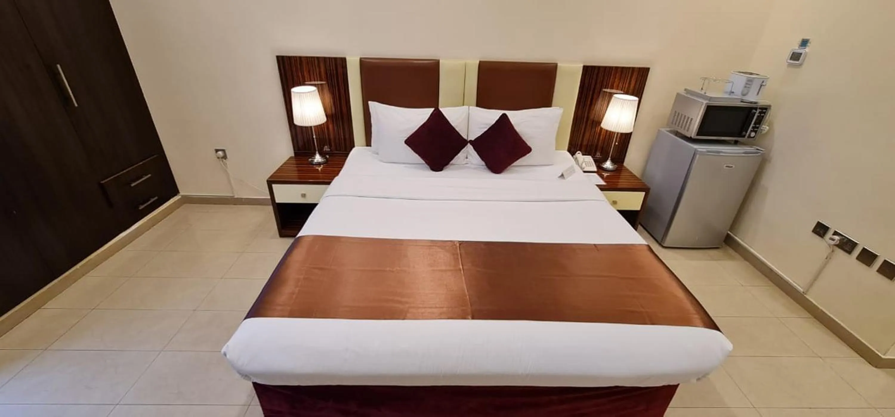 Bed in The View Al Barsha Hotel Apartments