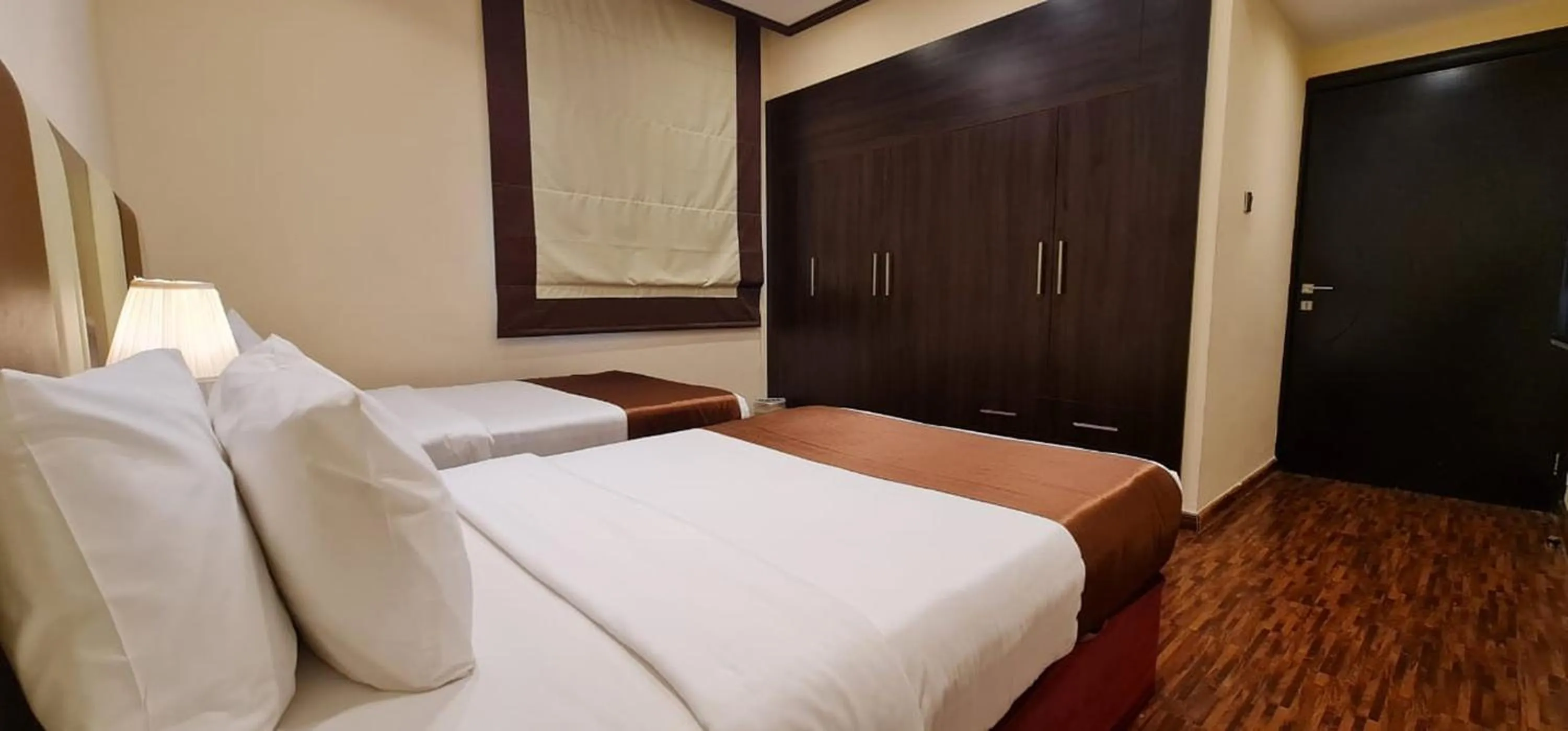 Bed in The View Al Barsha Hotel Apartments