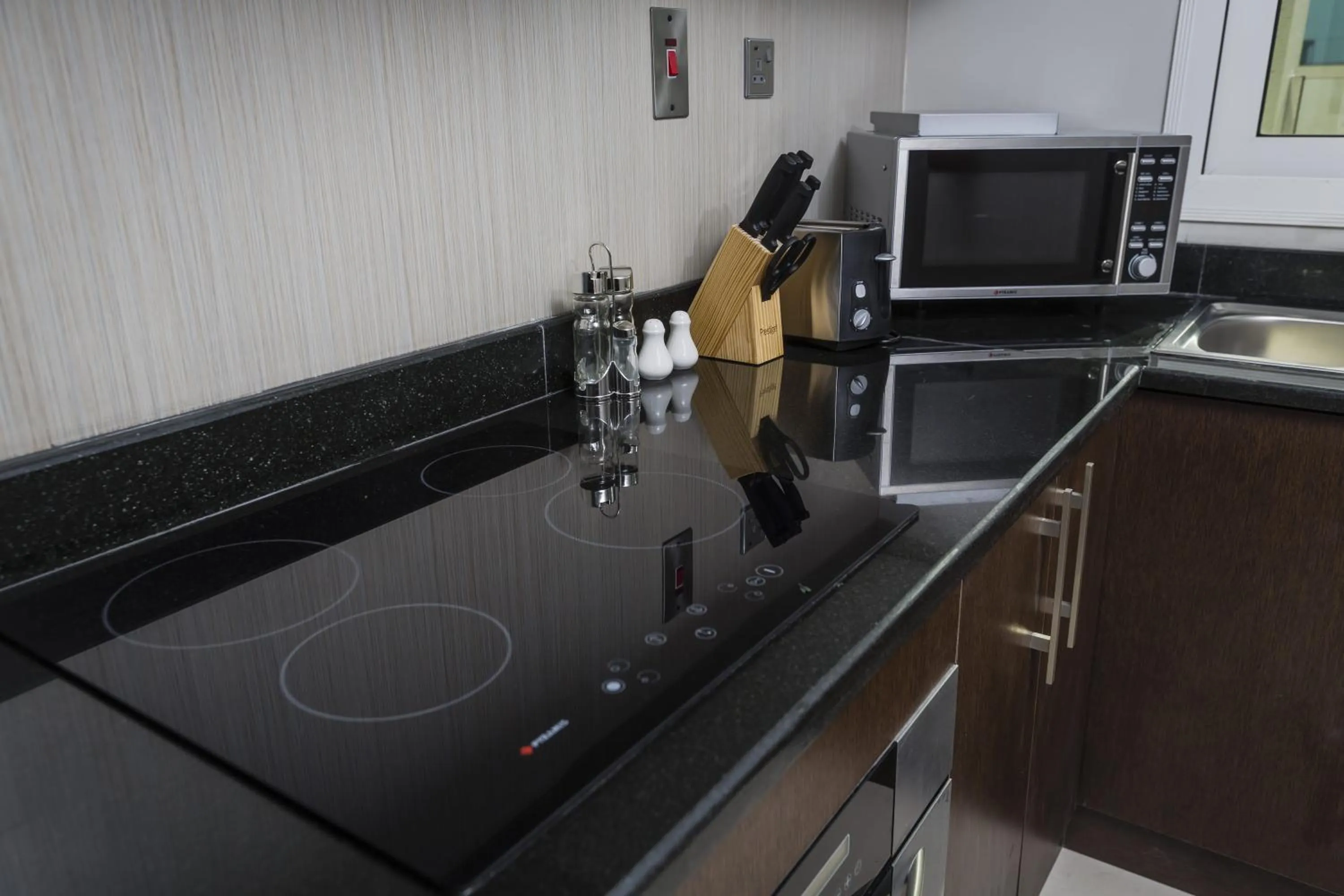 Kitchen or kitchenette in The View Al Barsha Hotel Apartments