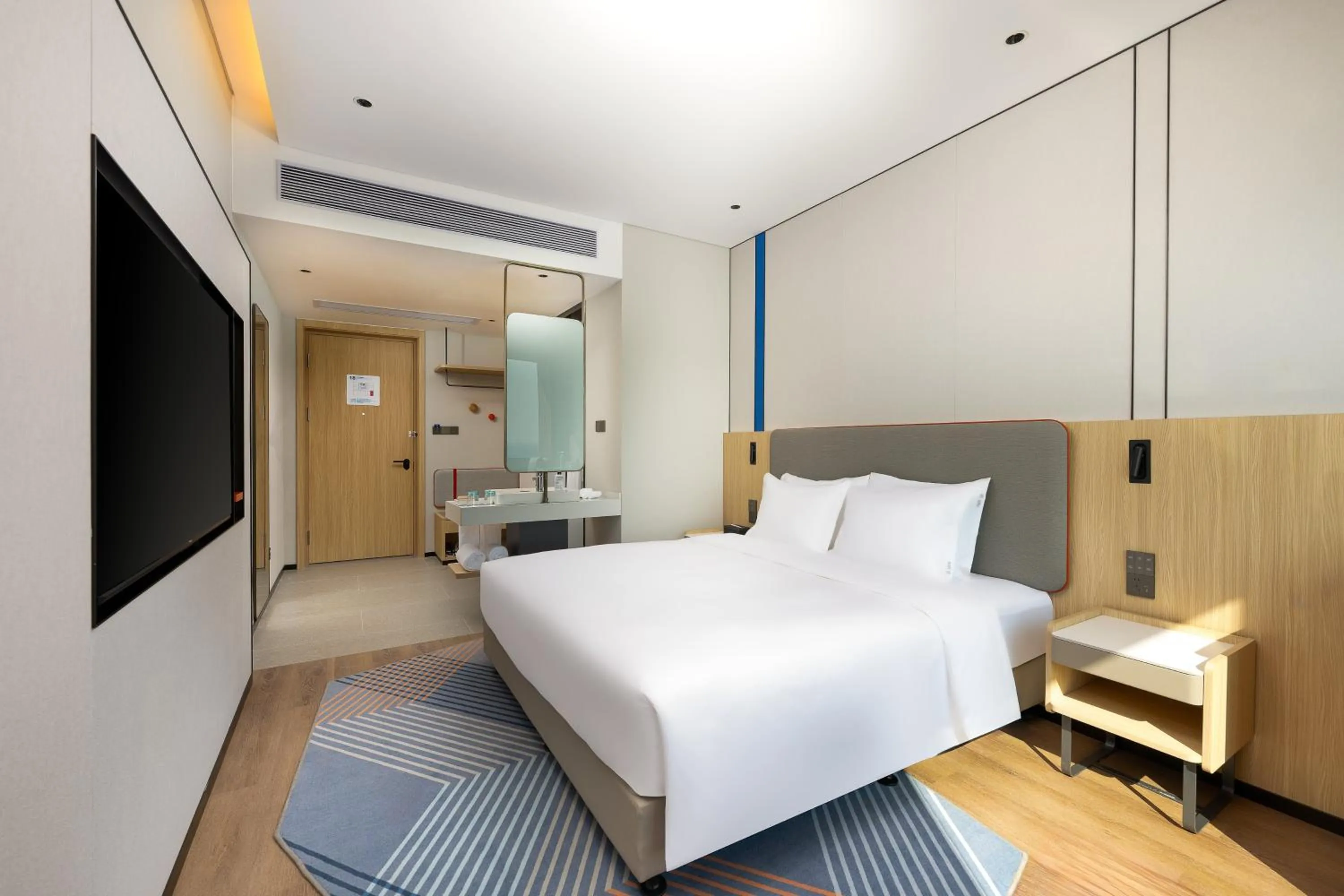 Photo of the whole room, Bed in Holiday Inn Express Zhanjiang Coast by IHG