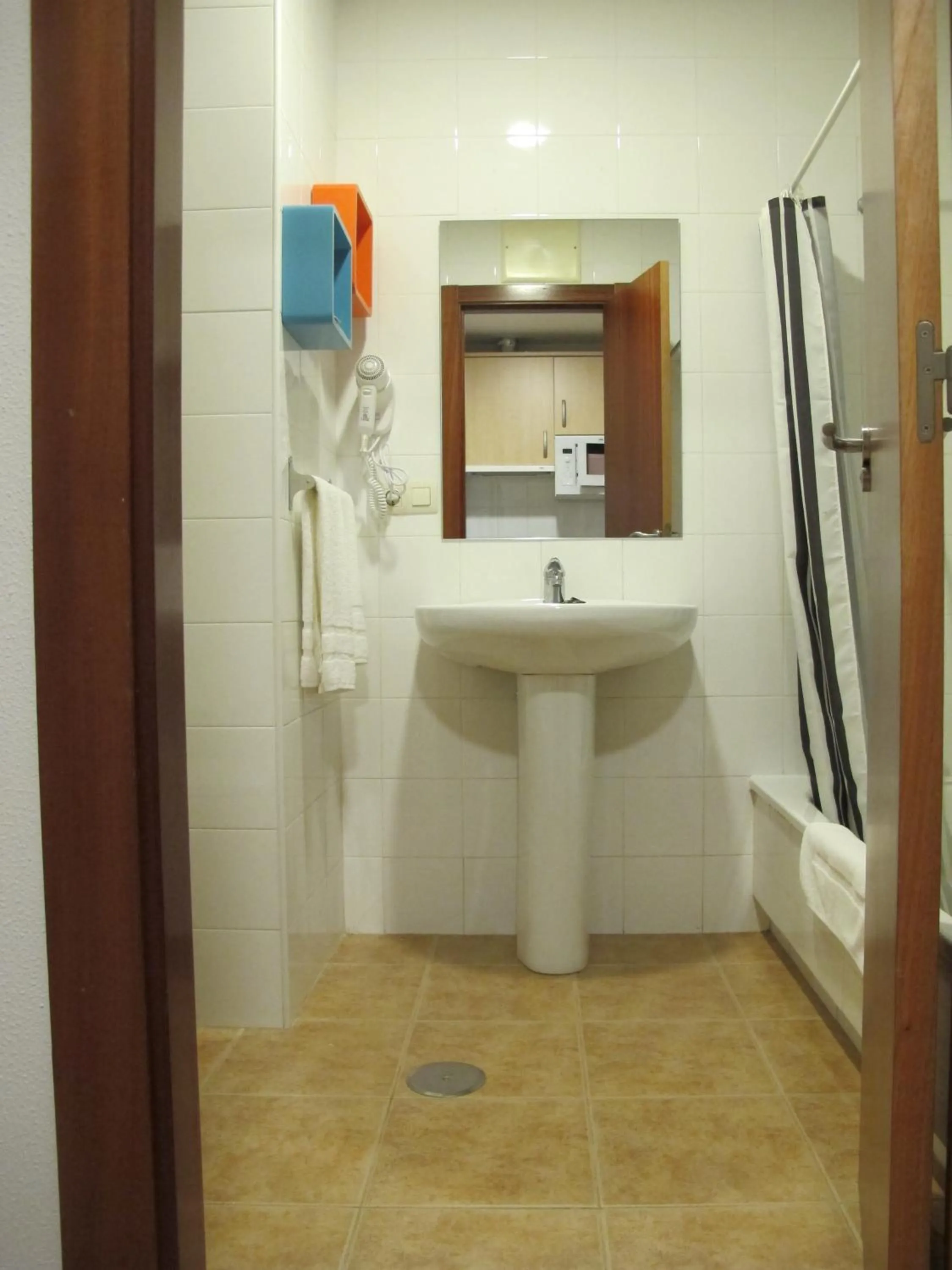 Bathroom in Apartamentos Turísticos Cancelas by Bossh Hotels