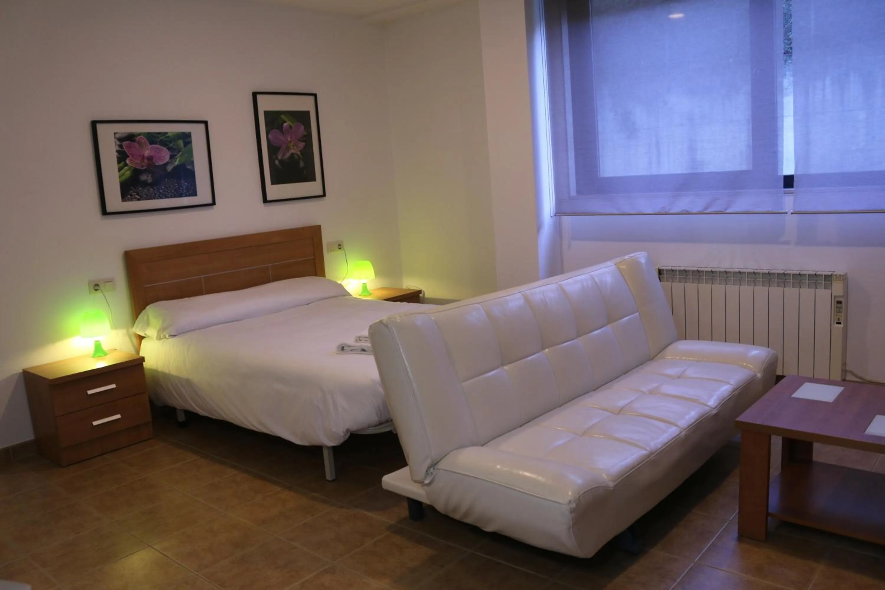 Bedroom, Bed in Apartamentos Turísticos Cancelas by Bossh Hotels