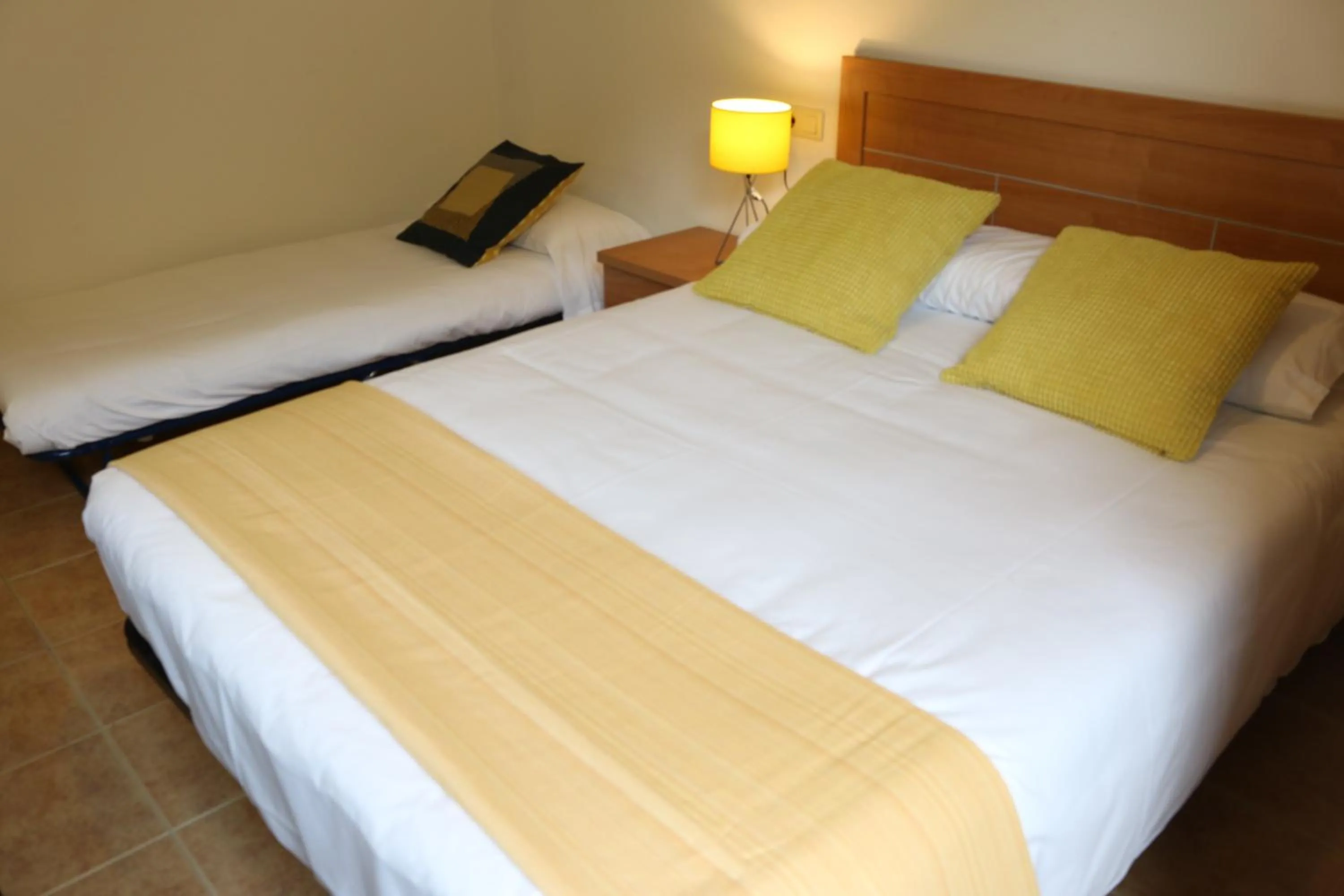 Bedroom, Bed in Apartamentos Turísticos Cancelas by Bossh Hotels