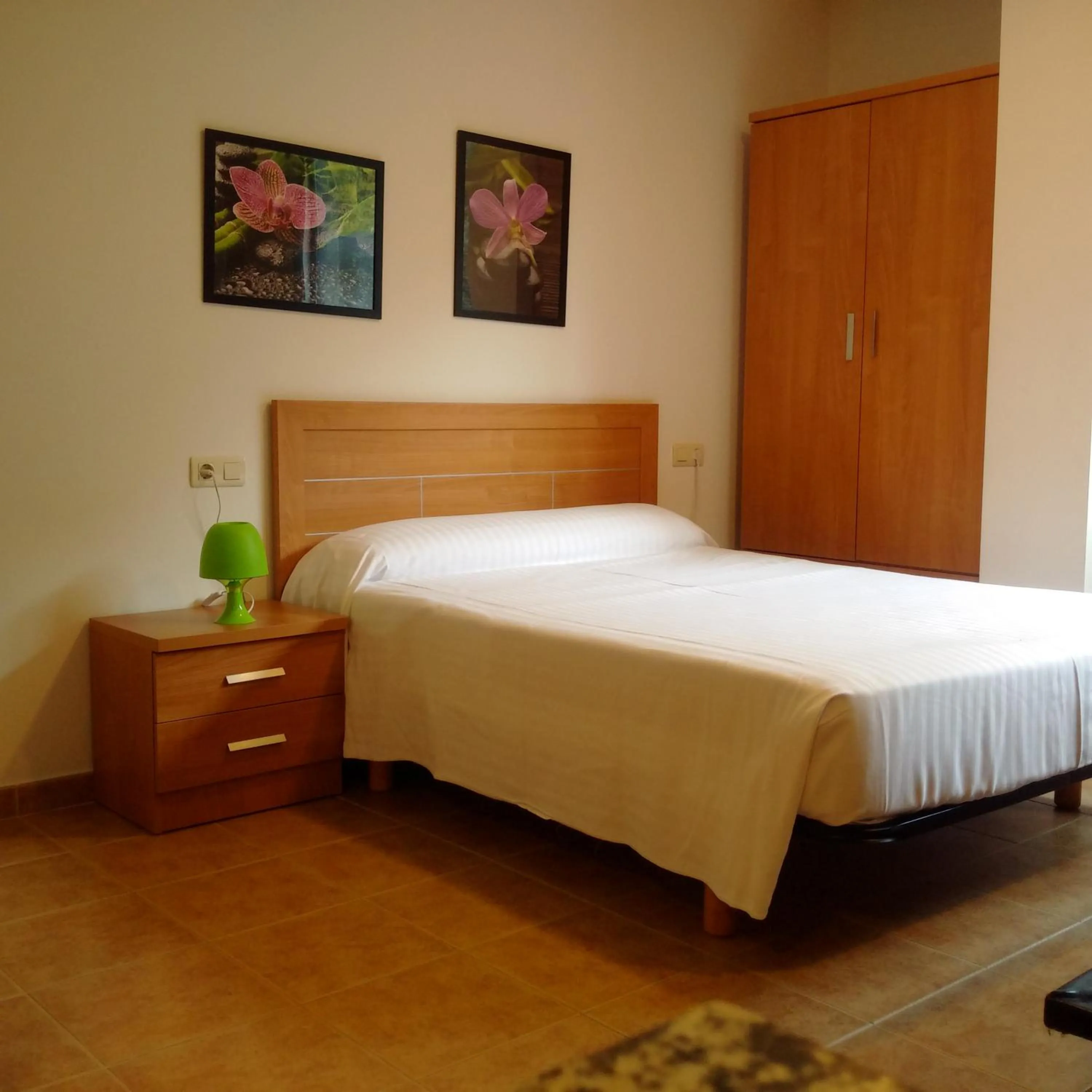 Bedroom, Bed in Apartamentos Turísticos Cancelas by Bossh Hotels