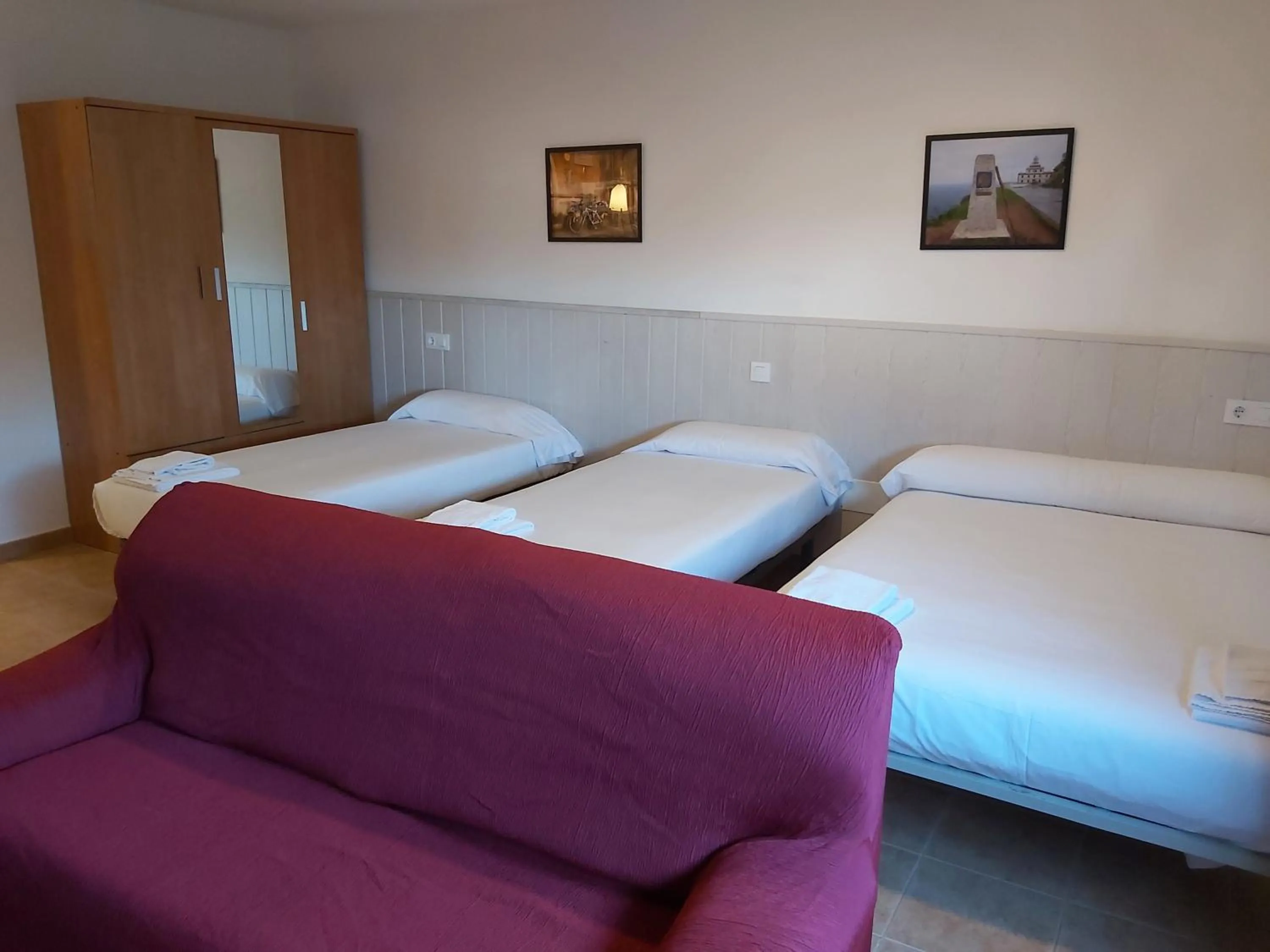 Bedroom, Bed in Apartamentos Turísticos Cancelas by Bossh Hotels