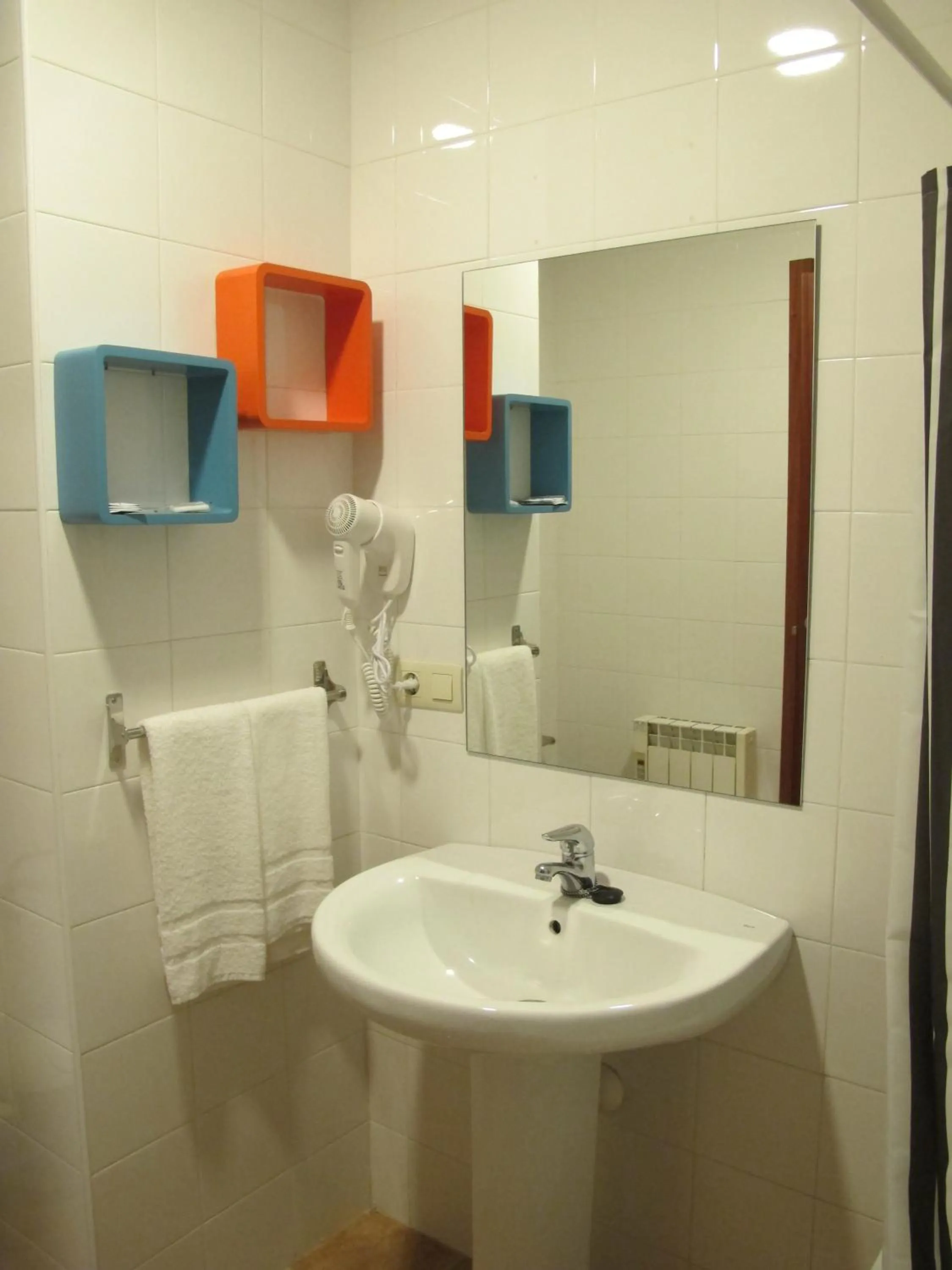 Bathroom in Apartamentos Turísticos Cancelas by Bossh Hotels