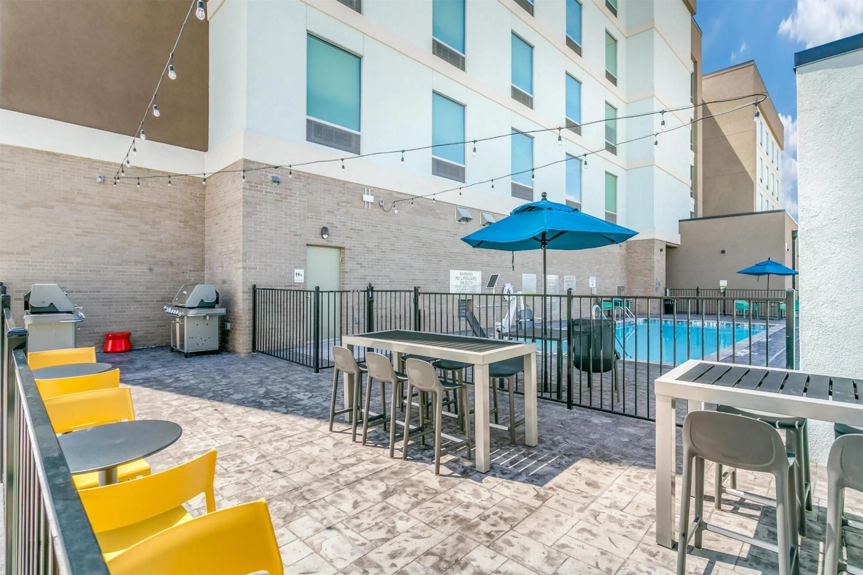 Pool view in Home2 Suites by Hilton Coppell DFW Grapevine North