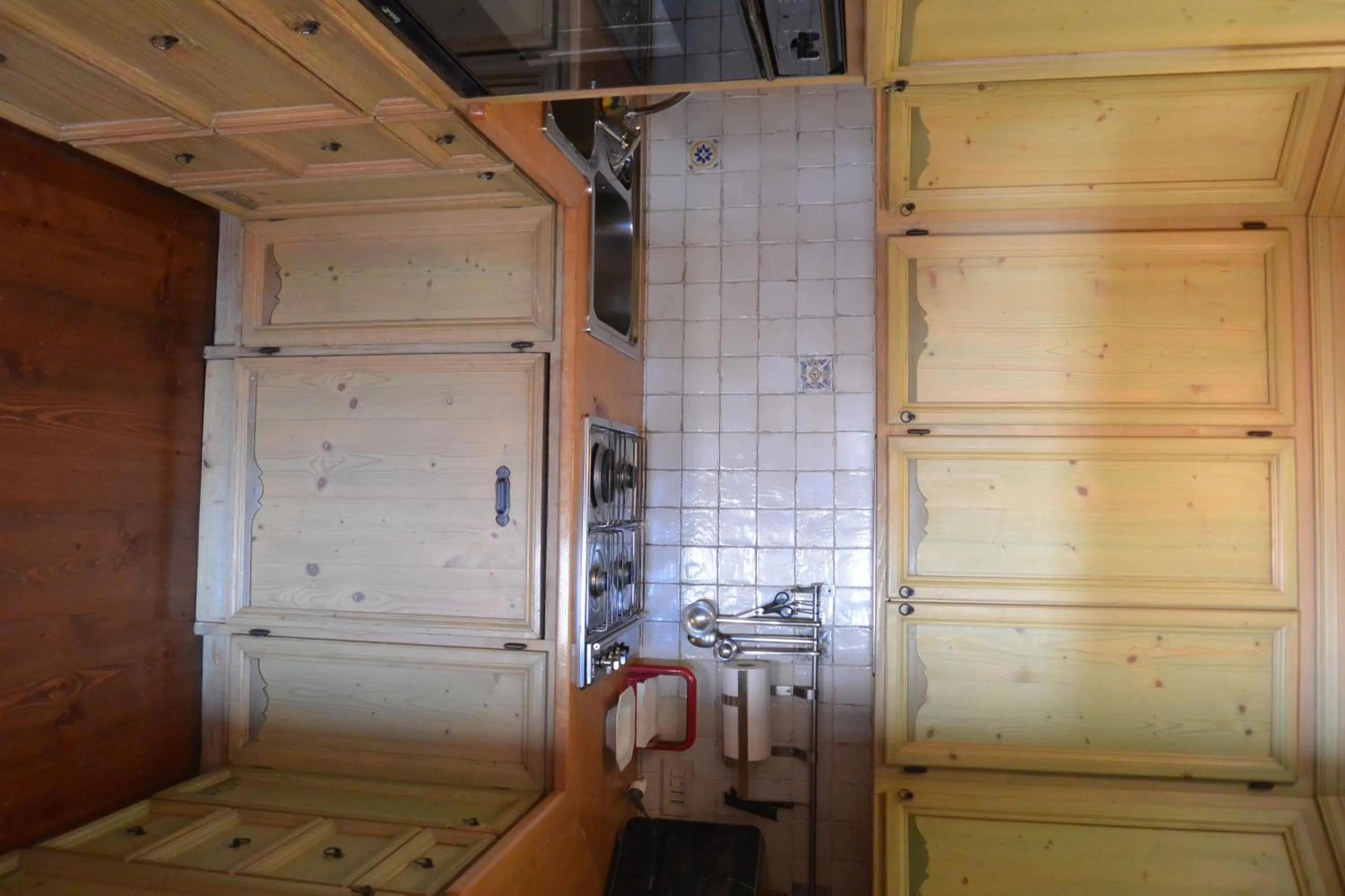 Kitchen or kitchenette in Villa Ronco - Stayincortina