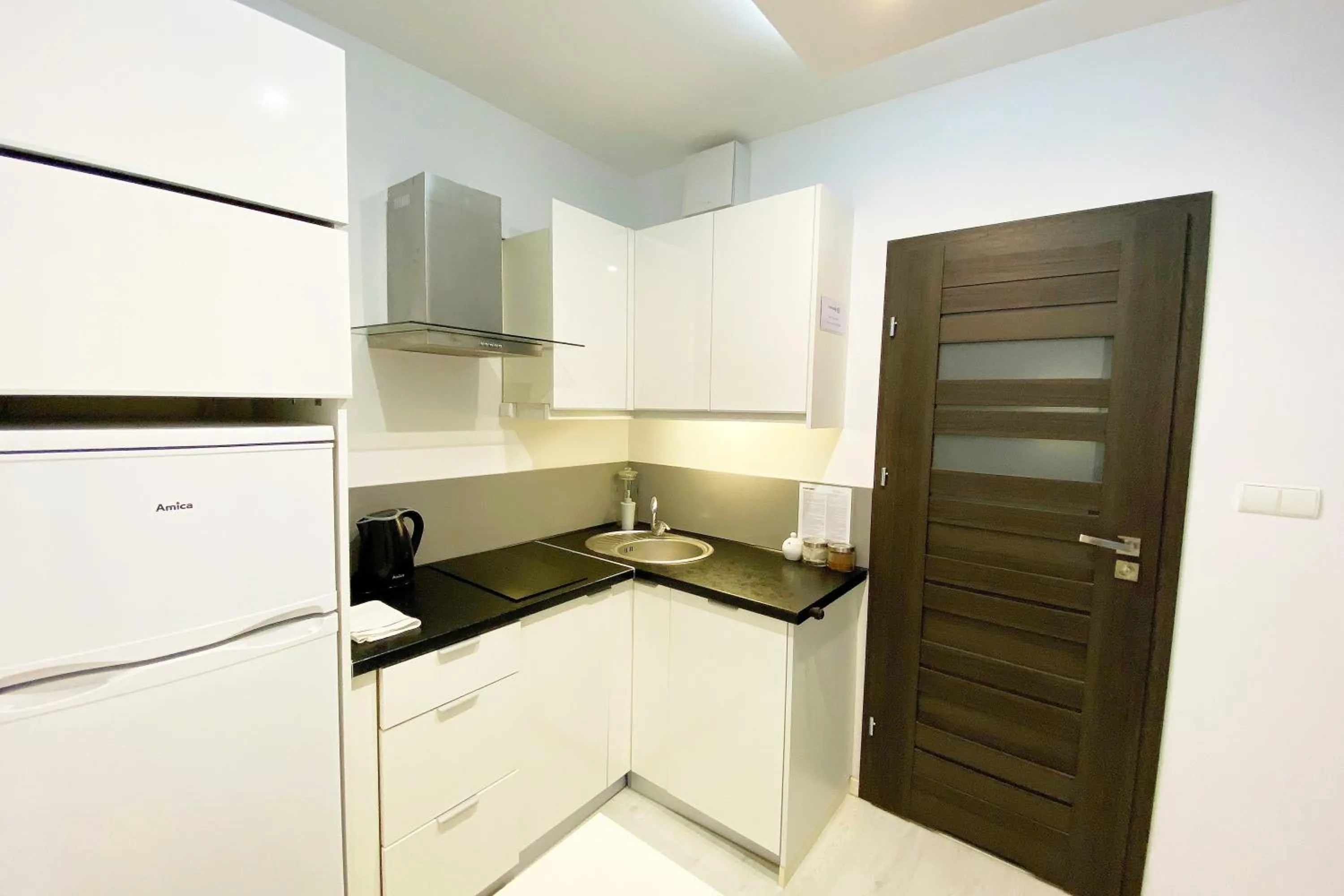 Kitchen or kitchenette in erApartments Oxygen Residence