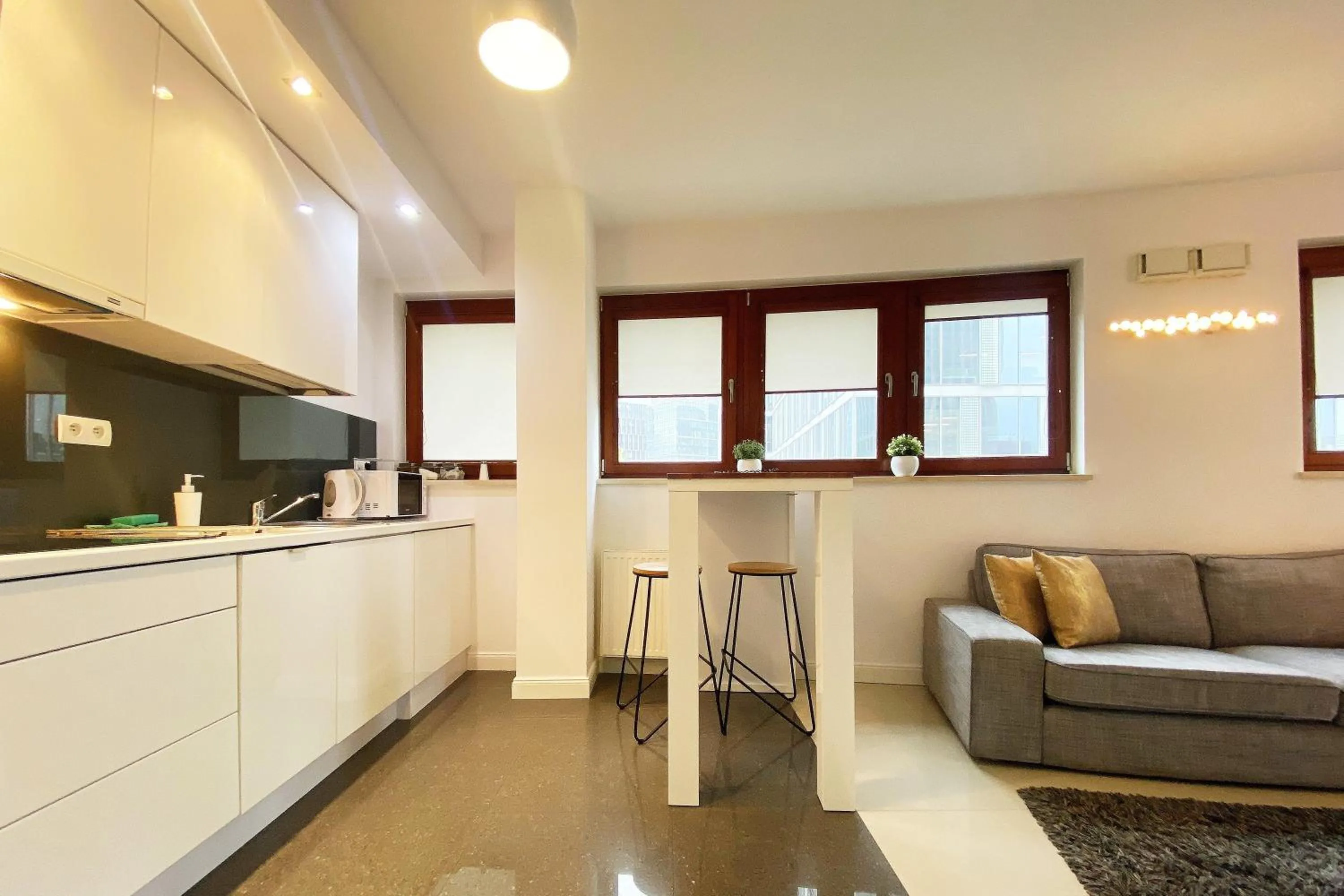 Kitchen or kitchenette in erApartments Oxygen Residence