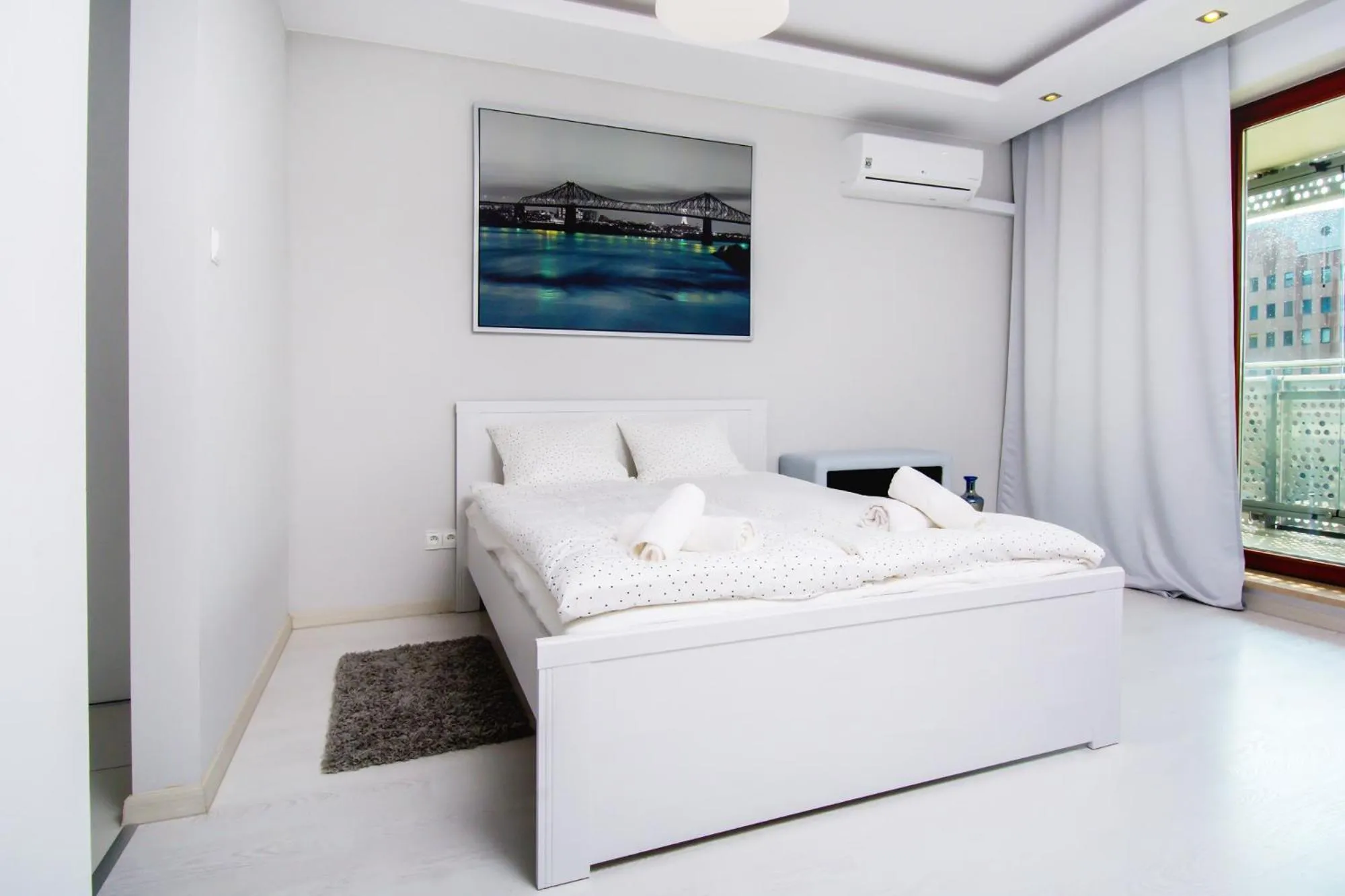 Bed in erApartments Oxygen Residence