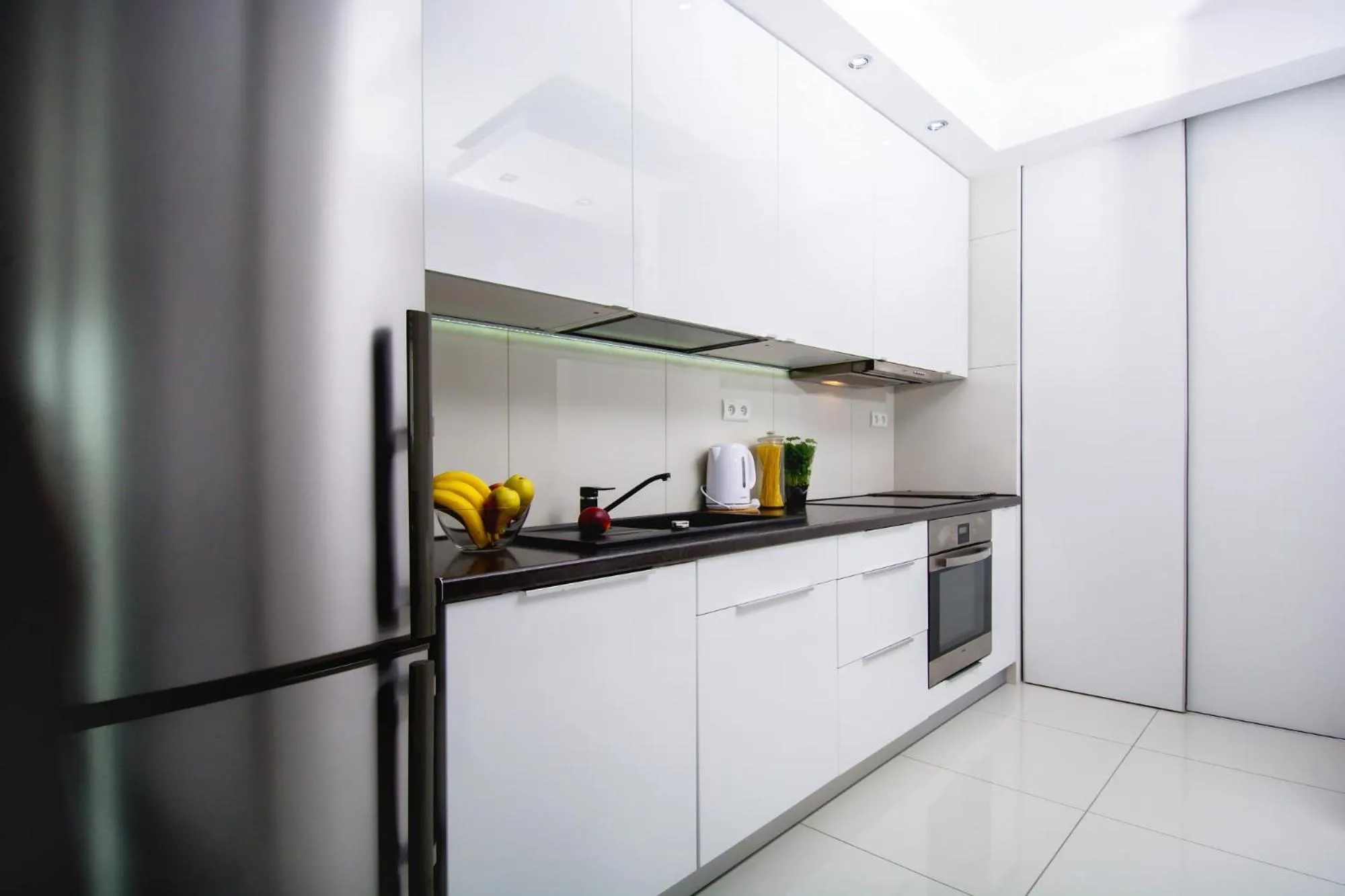 Kitchen or kitchenette in erApartments Oxygen Residence