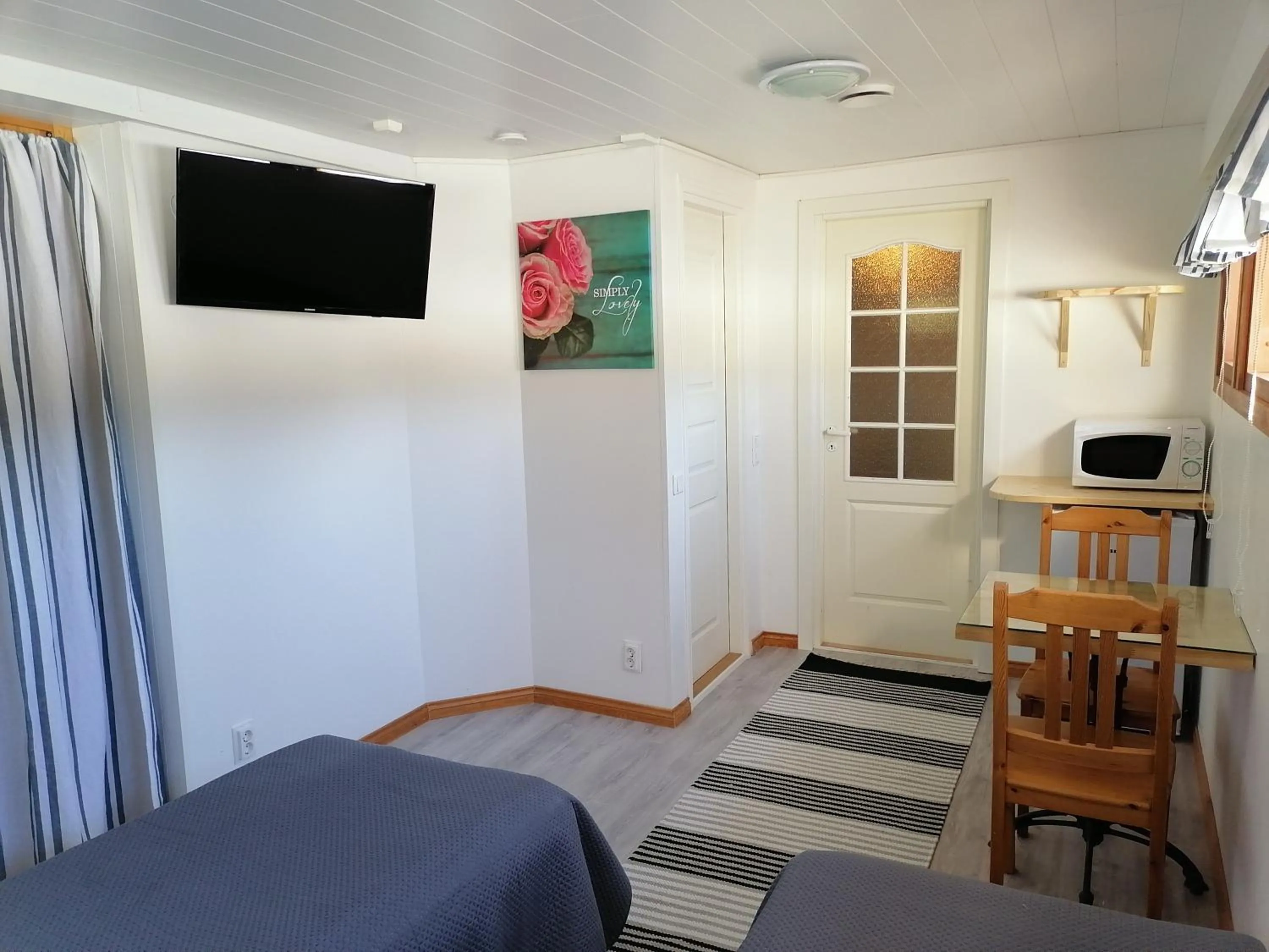 TV and multimedia, Bed in Hostel Mansikka