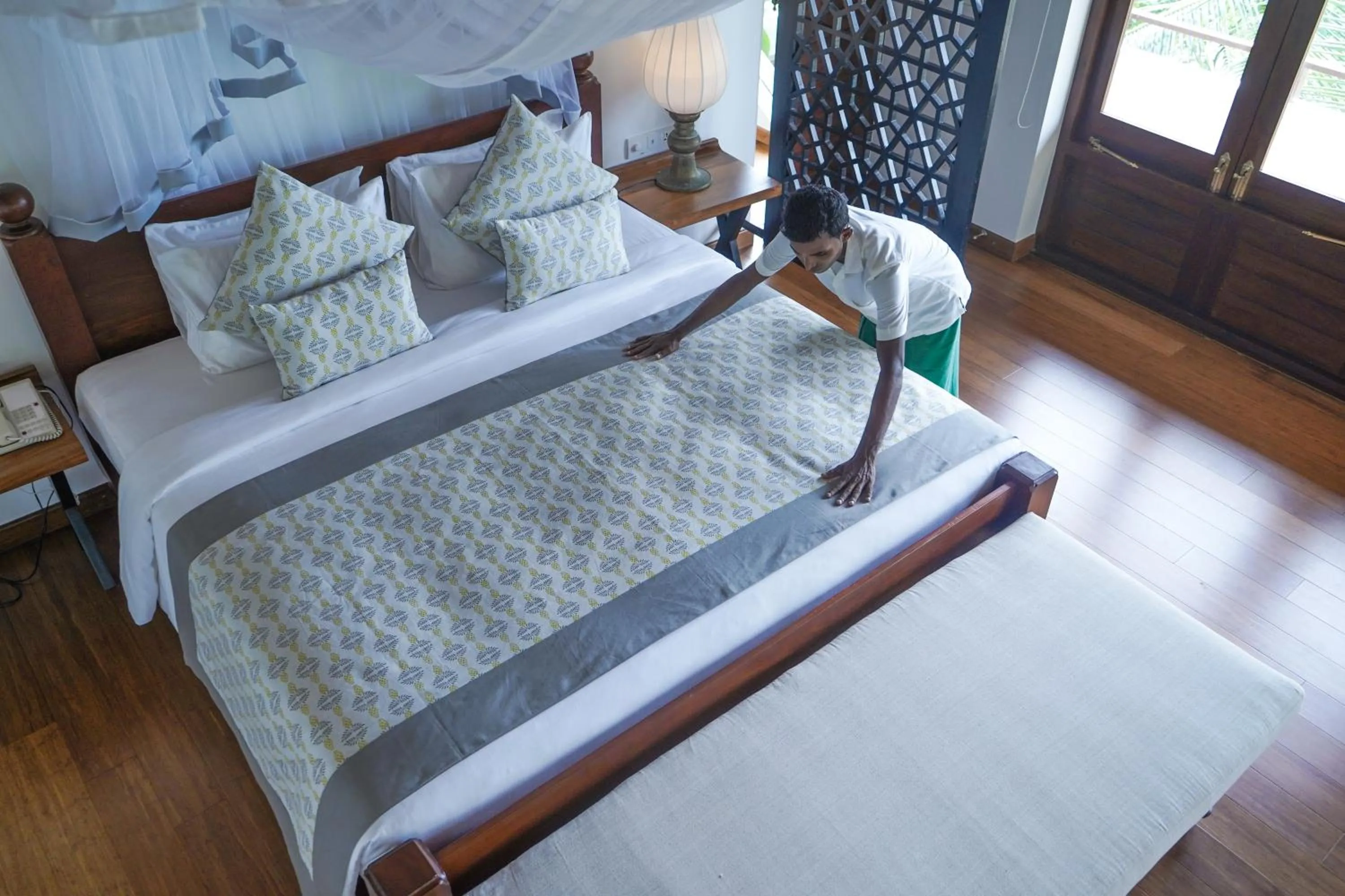 Bed in Calamansi Cove Villas