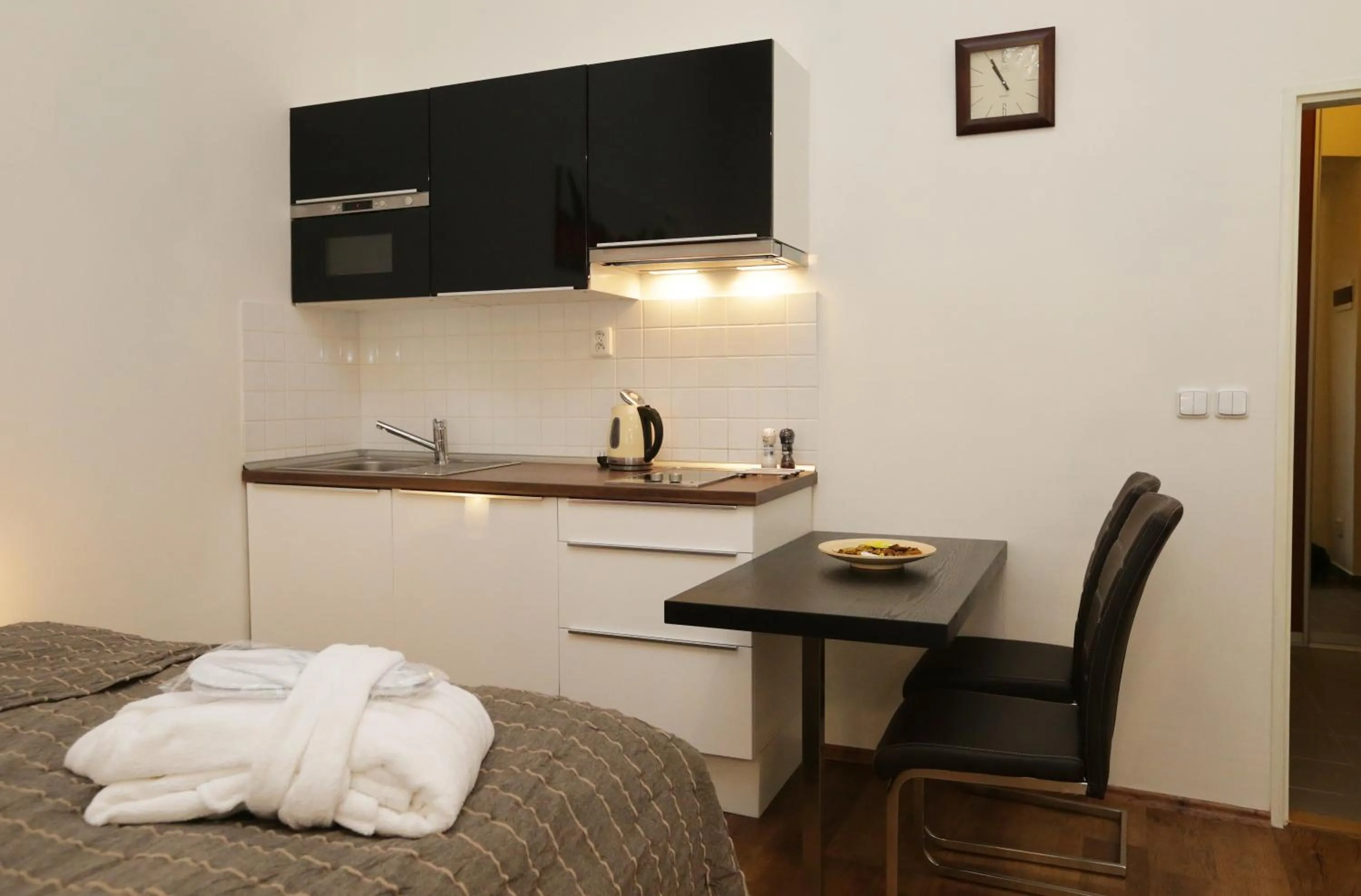 Kitchen or kitchenette, Bed in Greg Apartments Kampa Prague