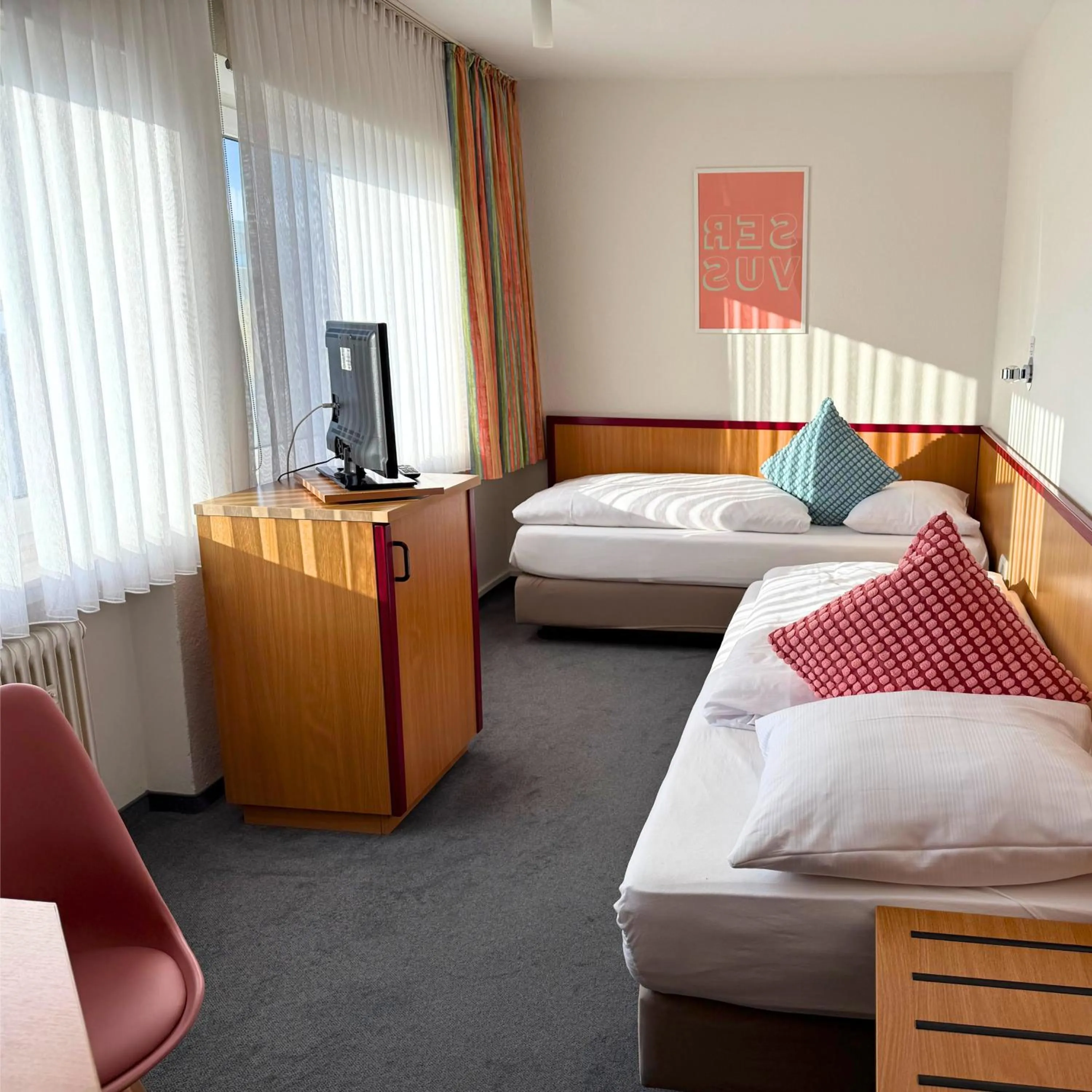 Photo of the whole room, Bed in Colourful Hotel