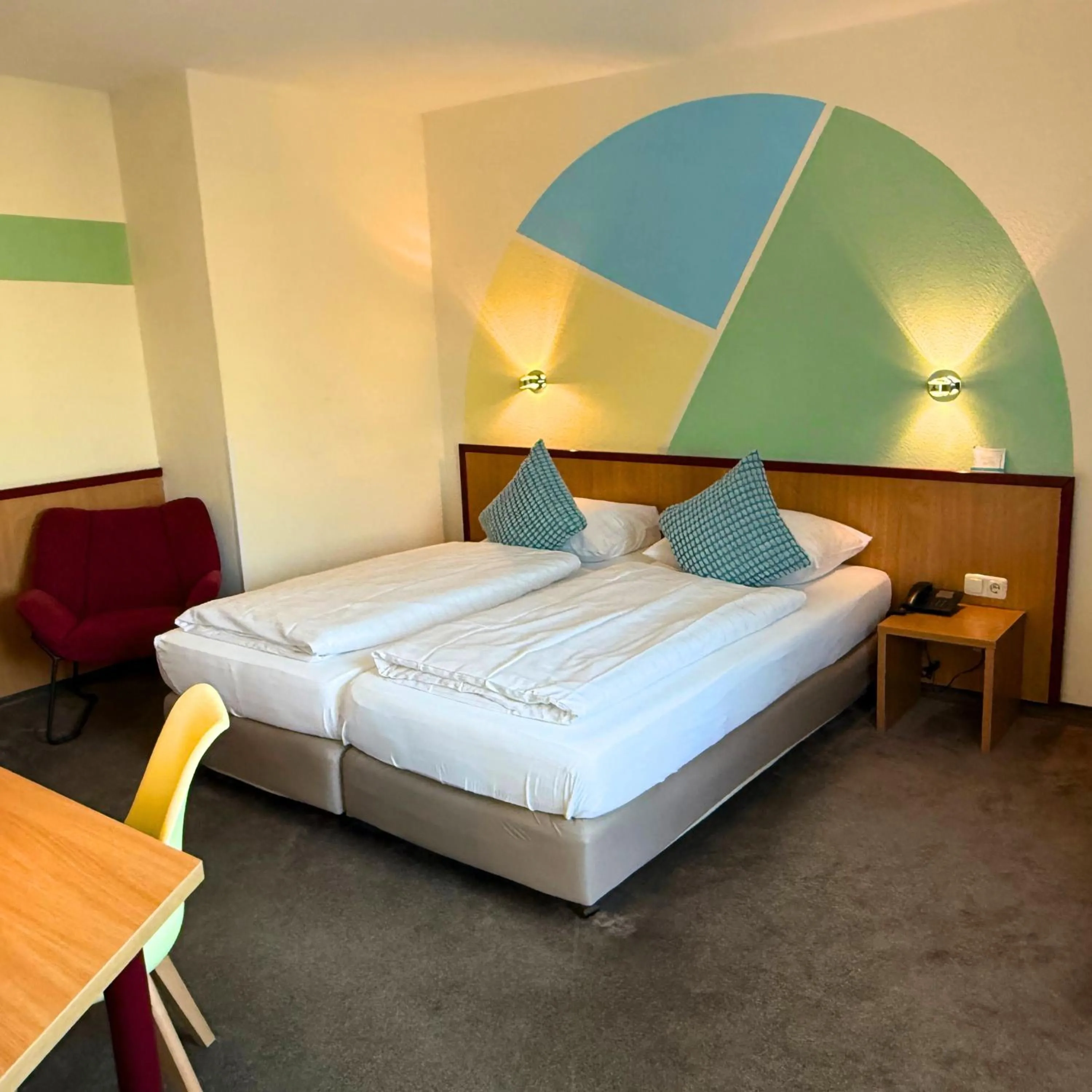 Photo of the whole room, Bed in Colourful Hotel