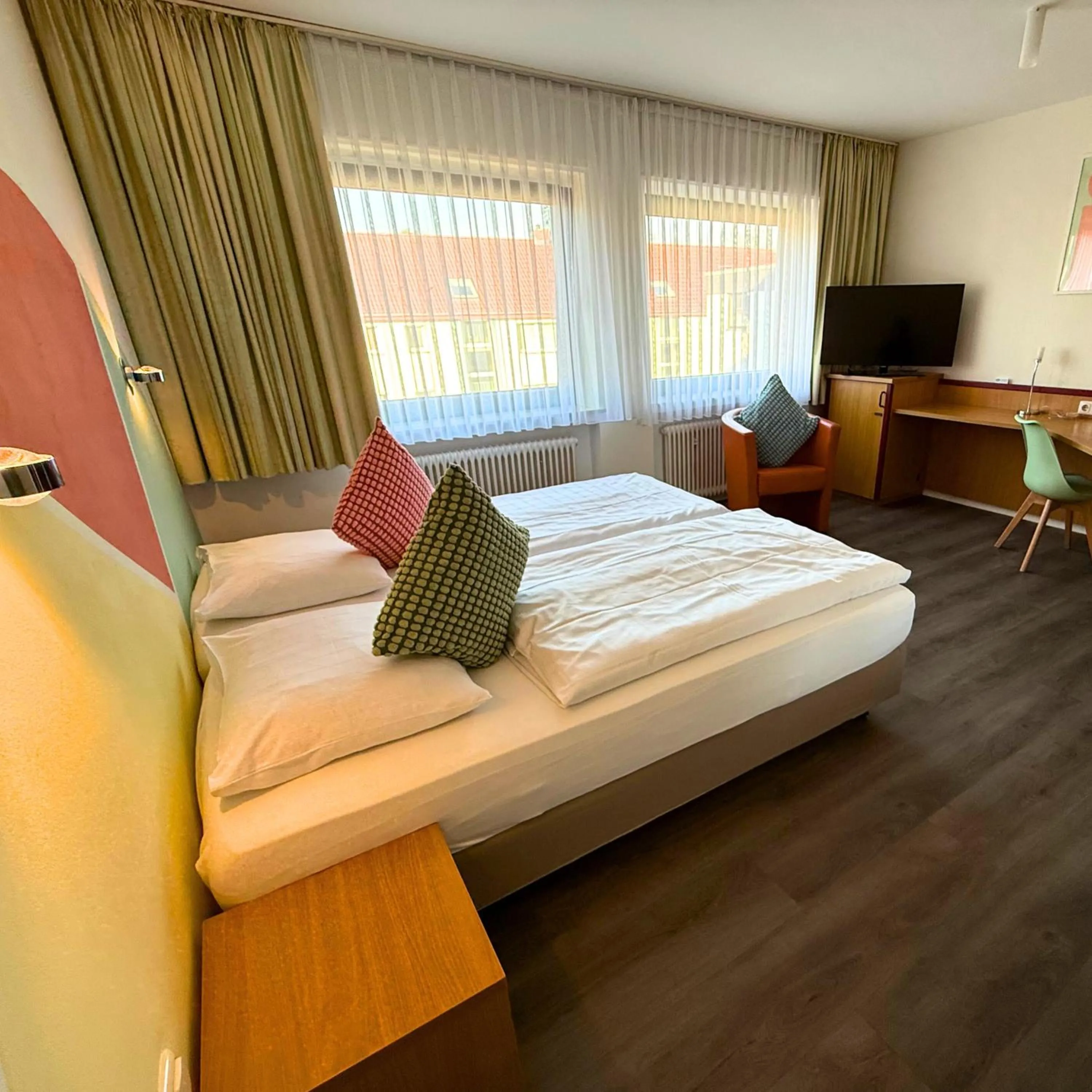 Photo of the whole room, Bed in Colourful Hotel