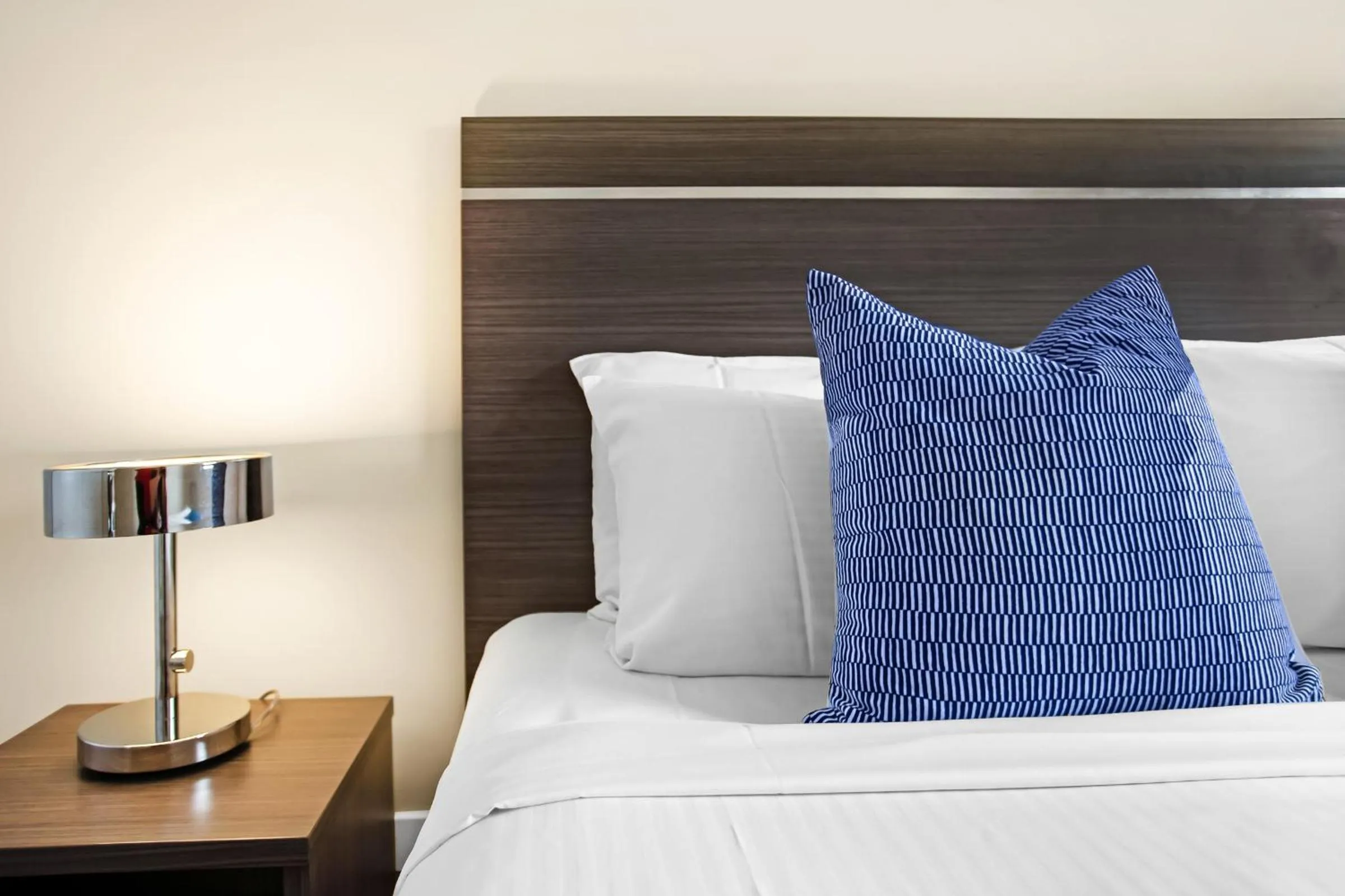 Bed in Hume Serviced Apartments