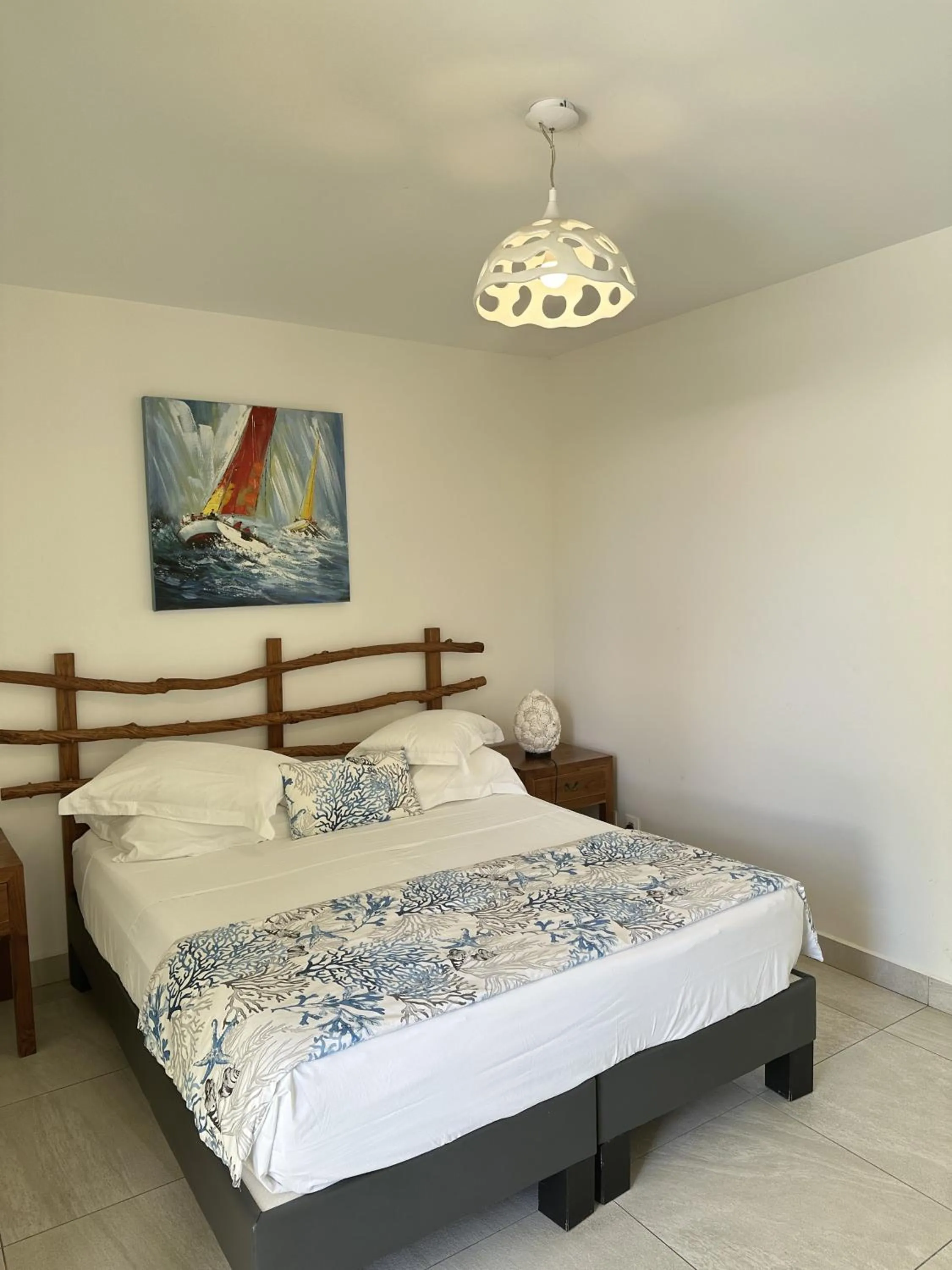 Bed in Majesty Palm Hôtel