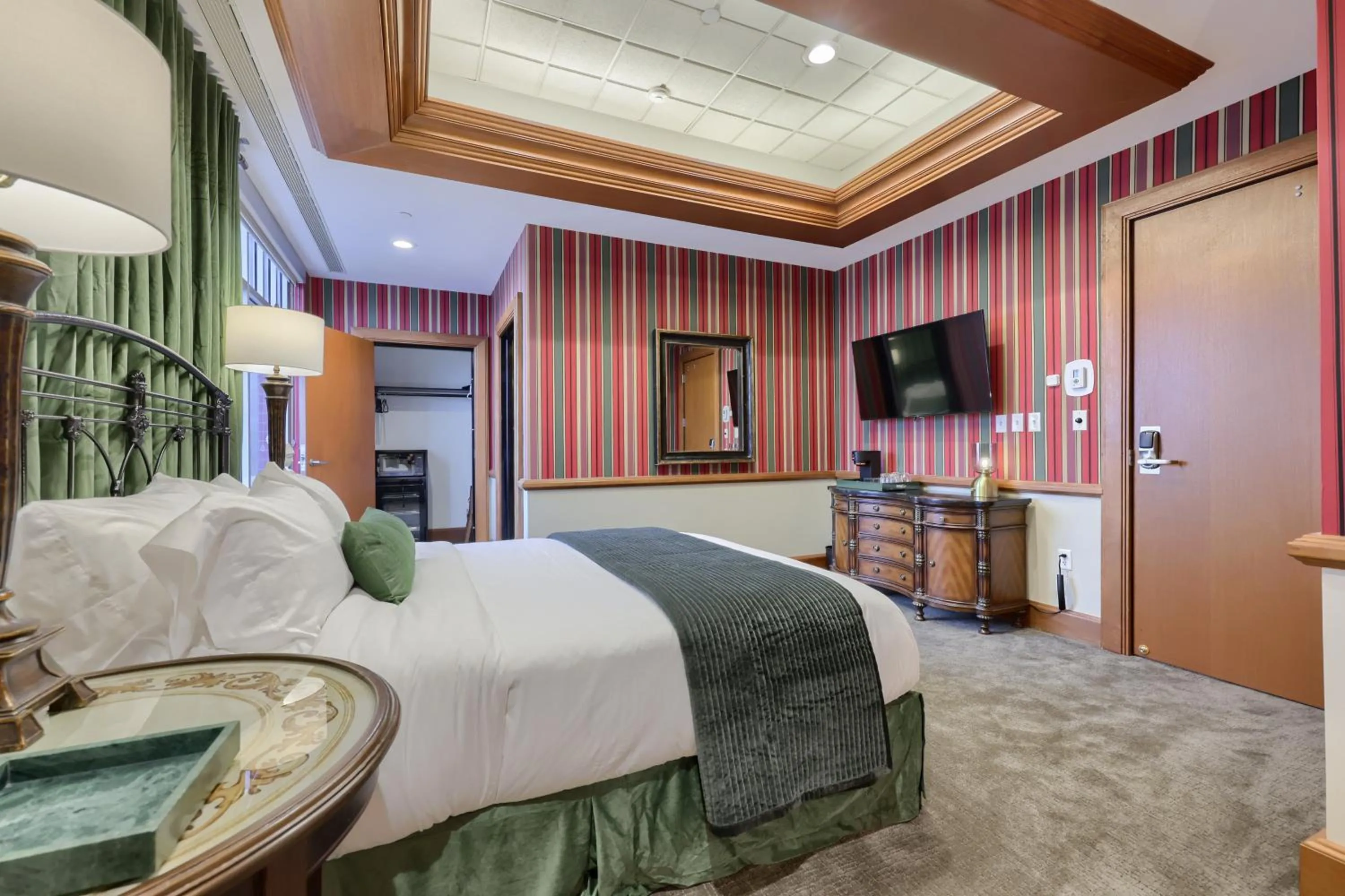 Photo of the whole room, Bed in The Executive Suites and Events