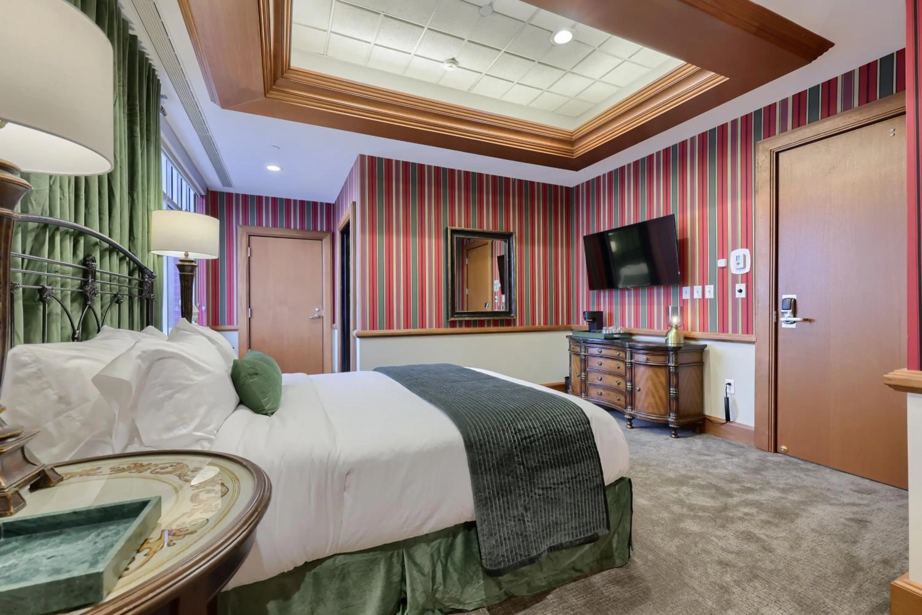 Photo of the whole room, Bed in The Executive Suites and Events