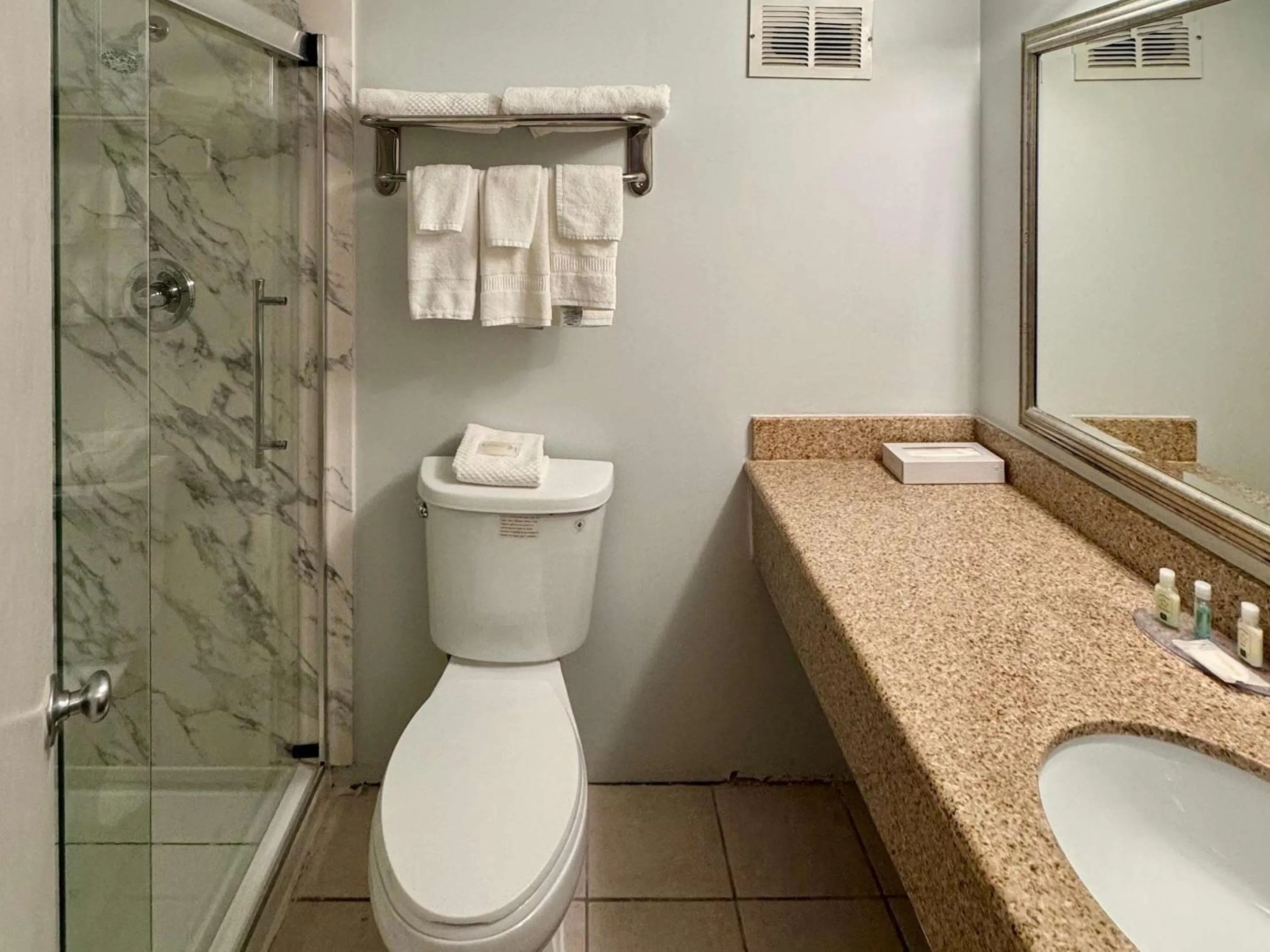 Bathroom in Suburban Studios East Syracuse Carrier Circle