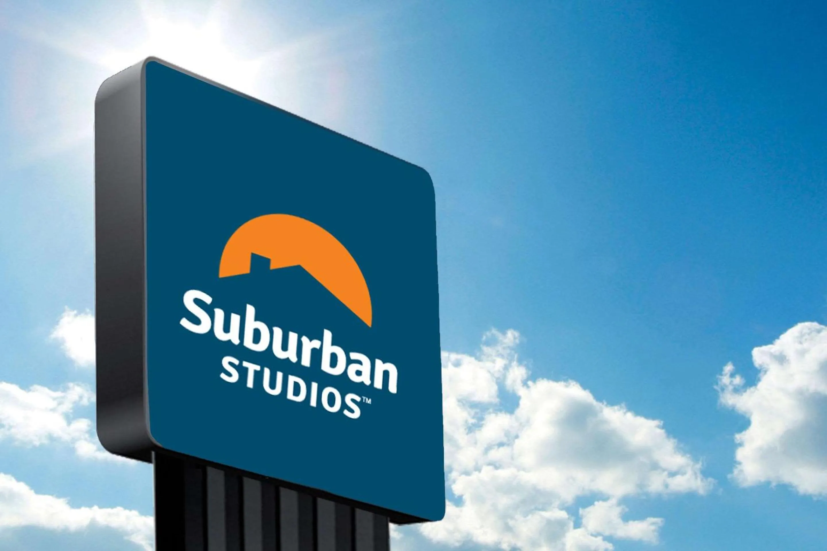Property building in Suburban Studios East Syracuse Carrier Circle