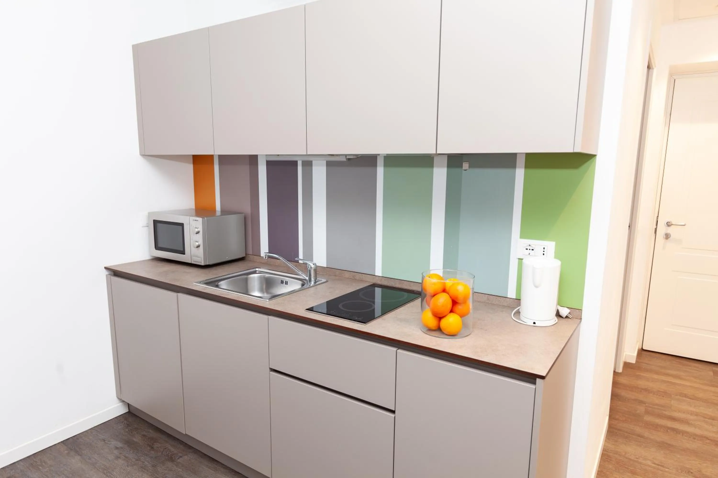 Kitchen or kitchenette in Studio Inn Centrale & Milano Urban Padel