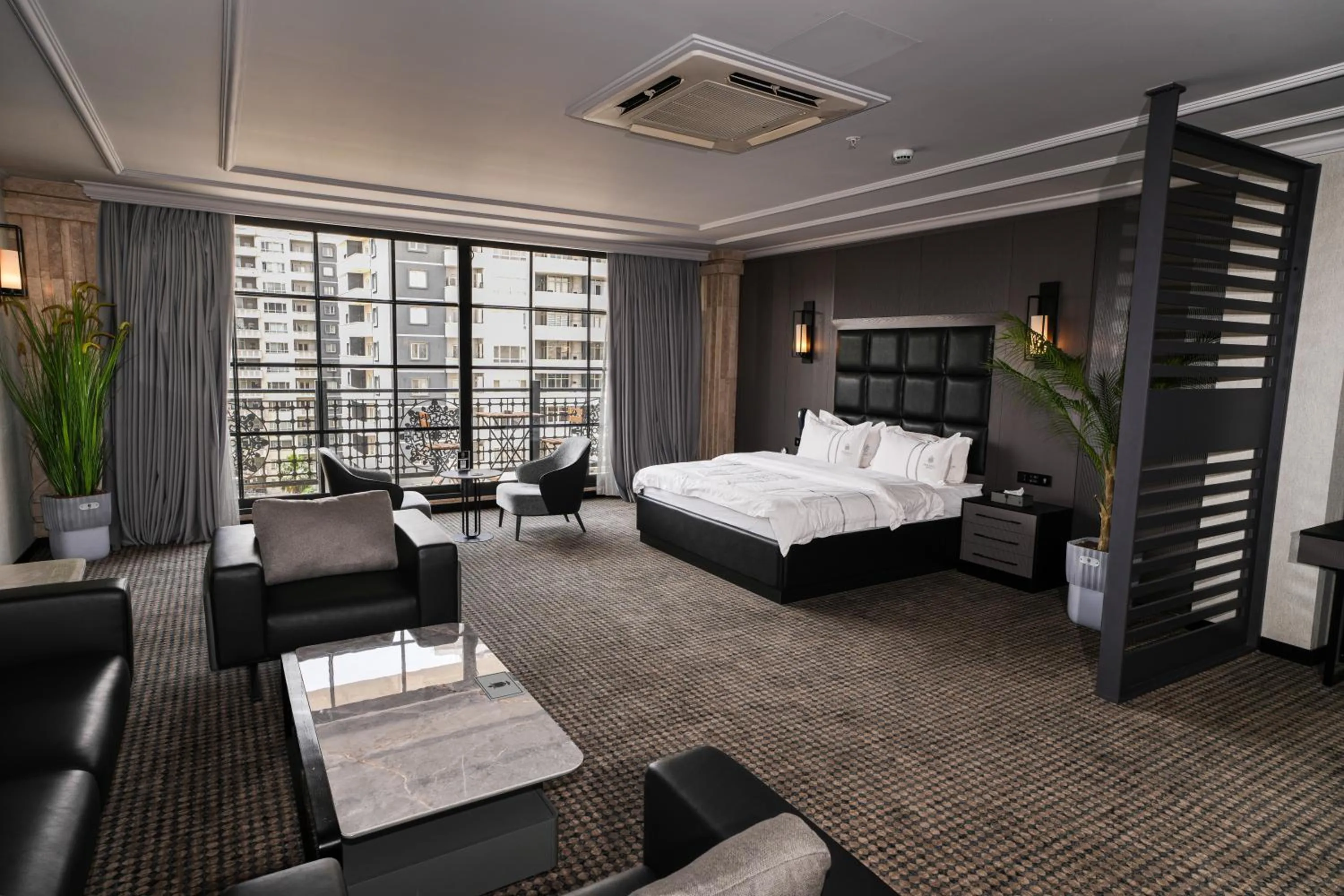 Seating area, Bed in Helmond Hotel