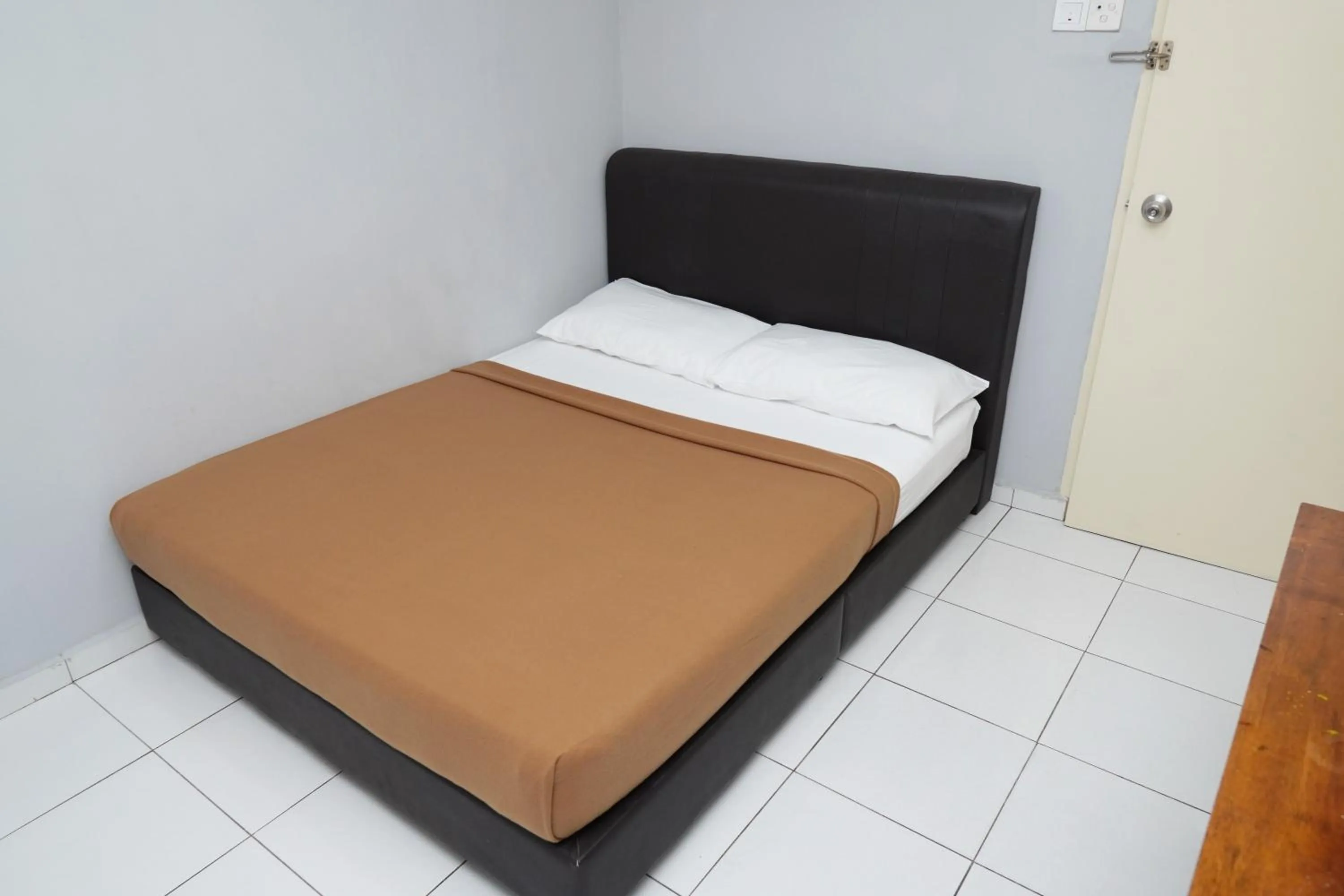 Bed in Hotel Sixty Nine