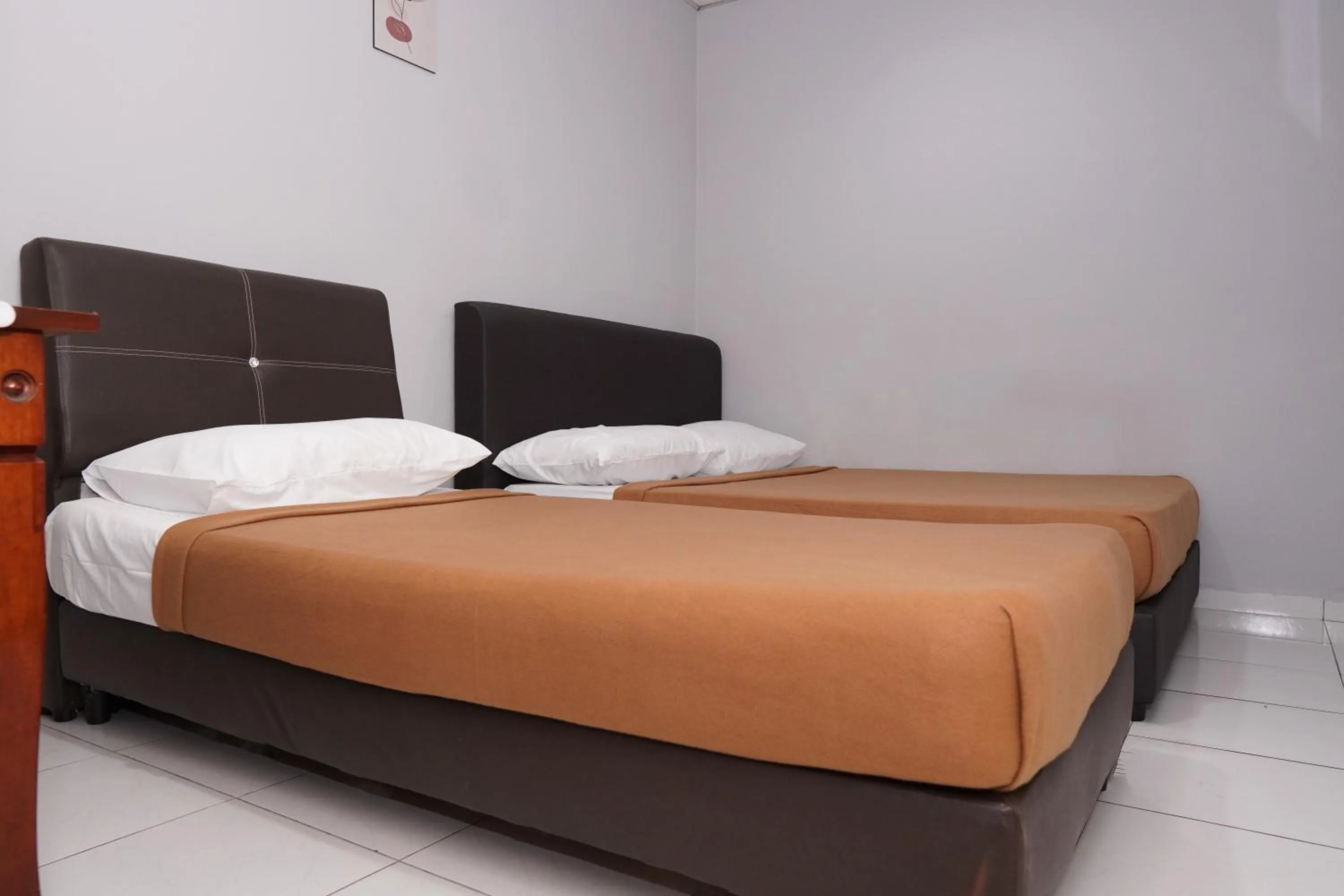 Bed in Hotel Sixty Nine