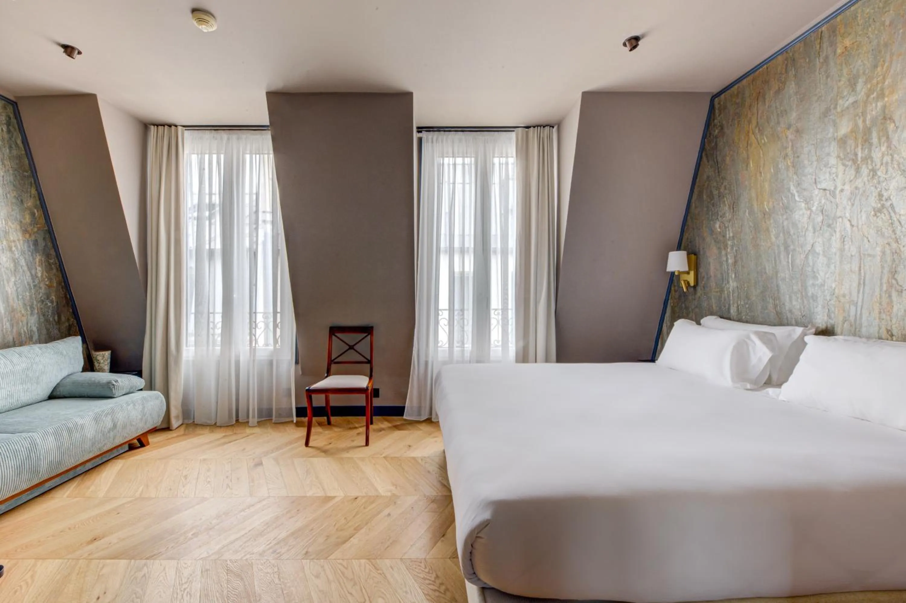Bed in Hôtel Maât Batignolles