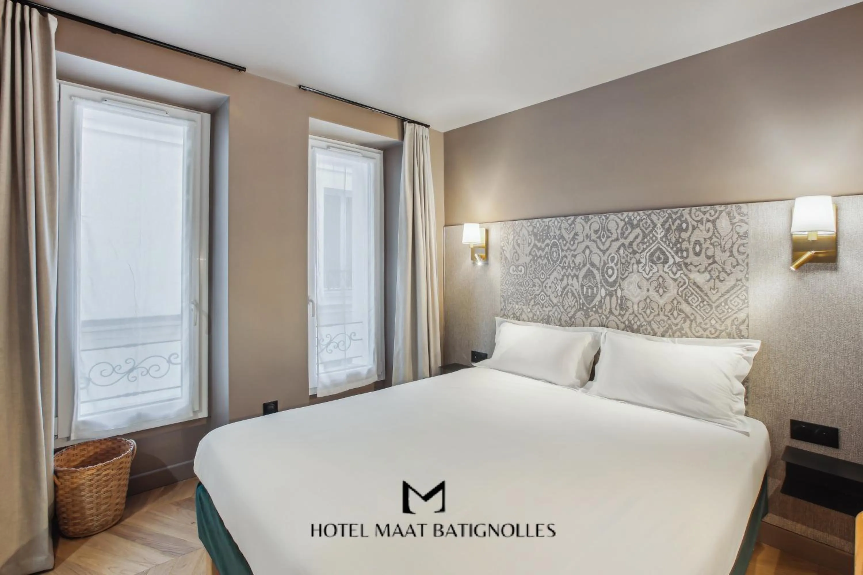 Bed in Hôtel Maât Batignolles