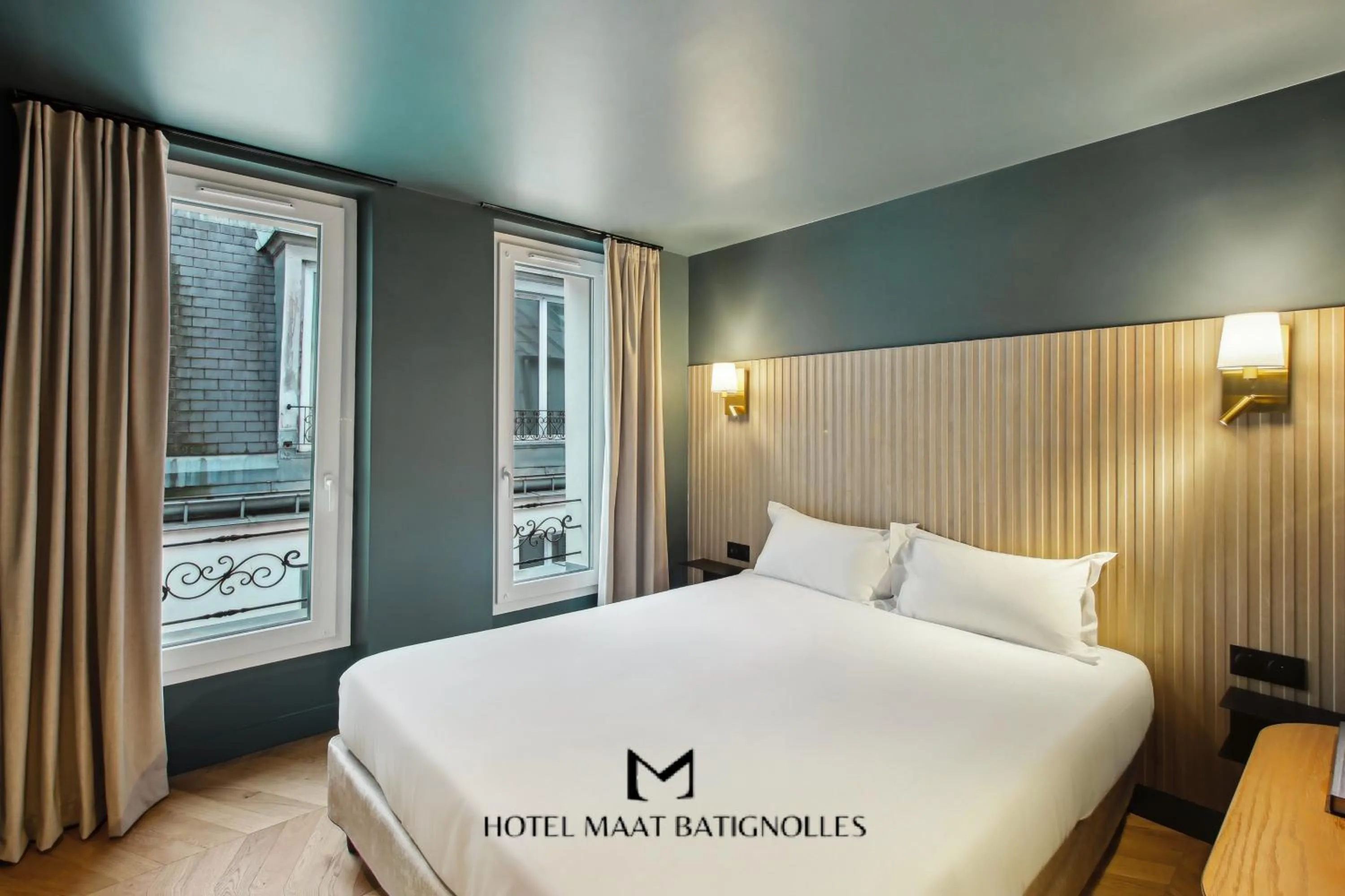 Bed in Hôtel Maât Batignolles