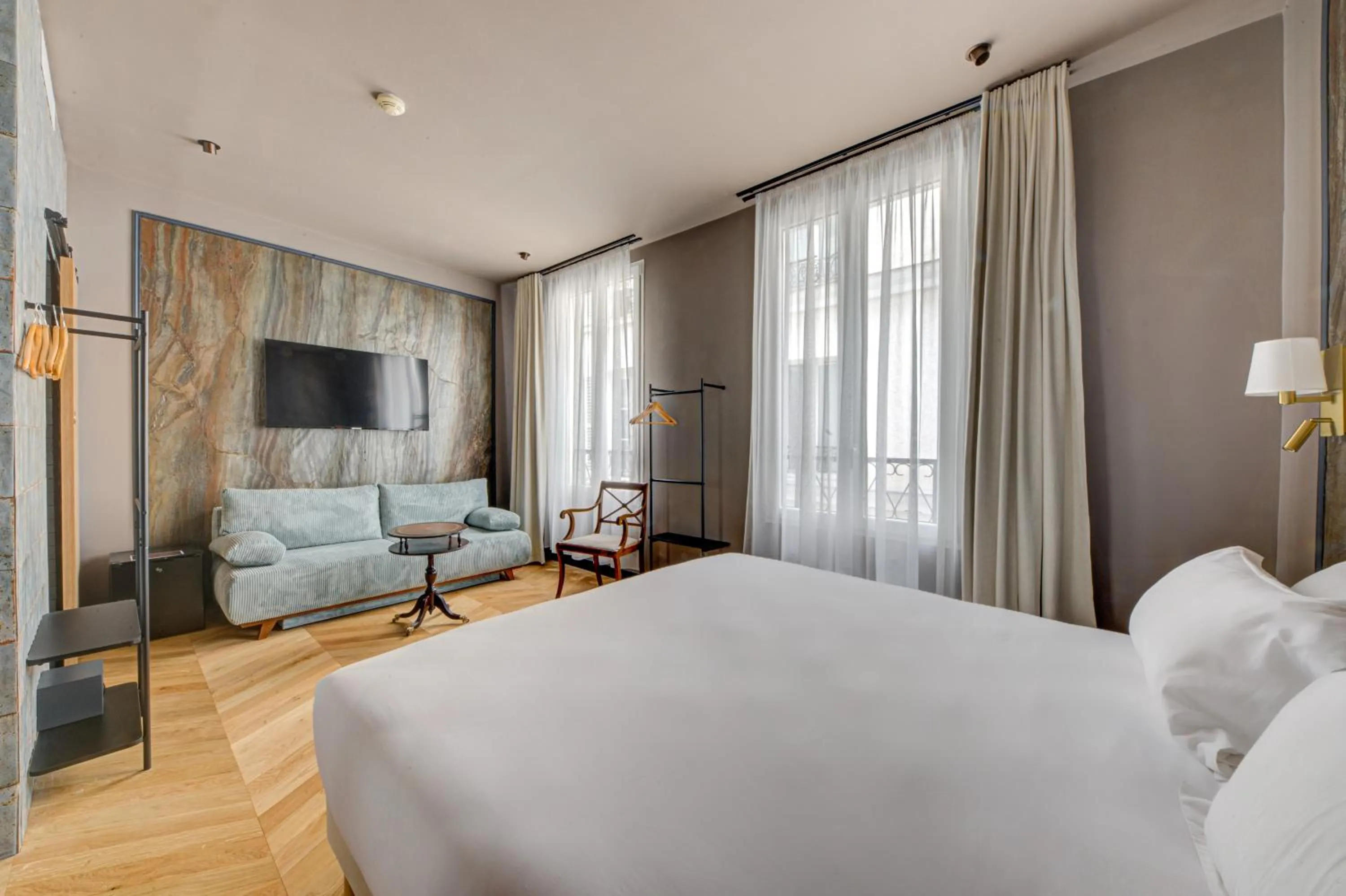 Photo of the whole room, Bed in Hôtel Maât Batignolles