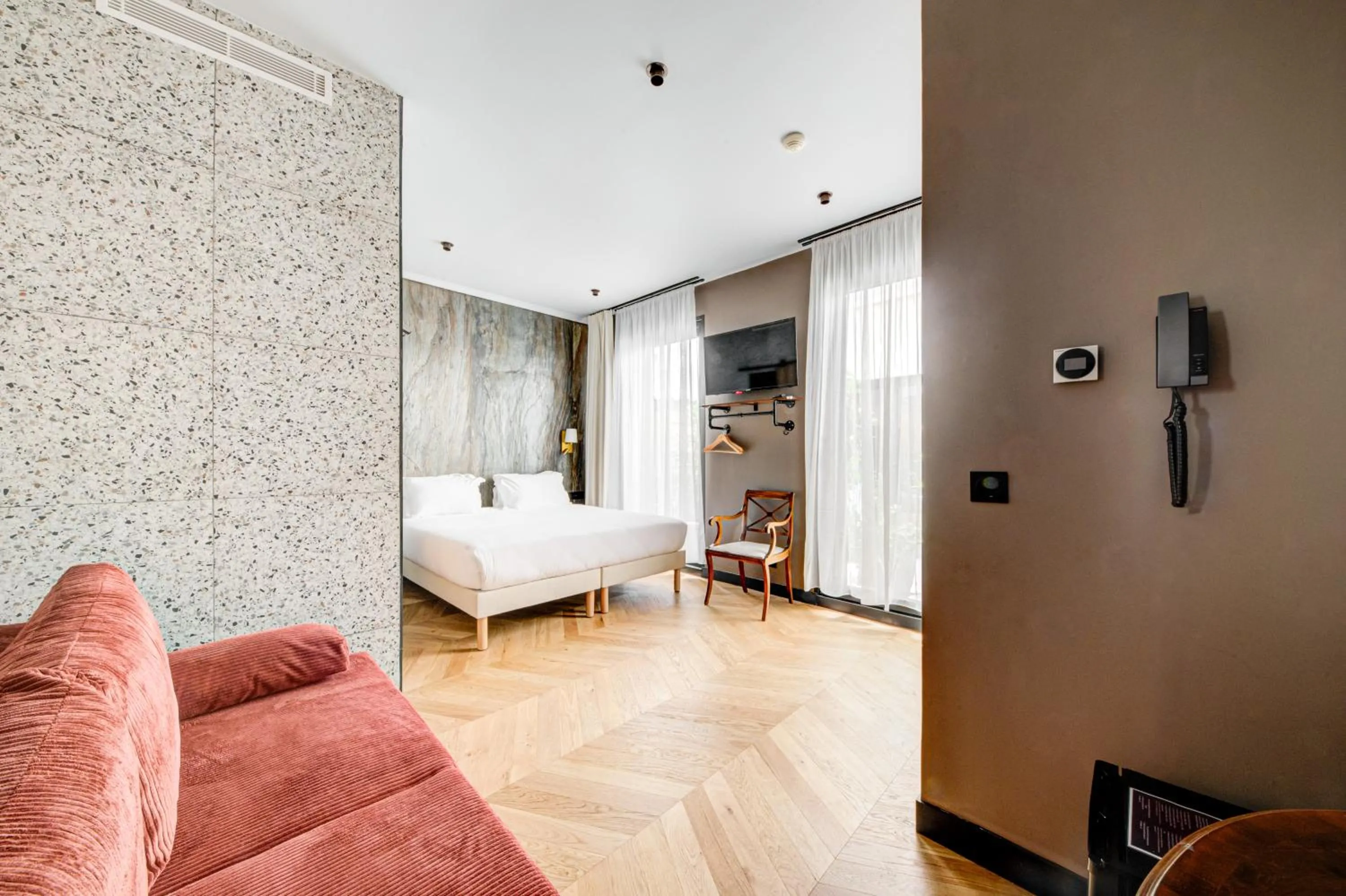 Bed in Hôtel Maât Batignolles