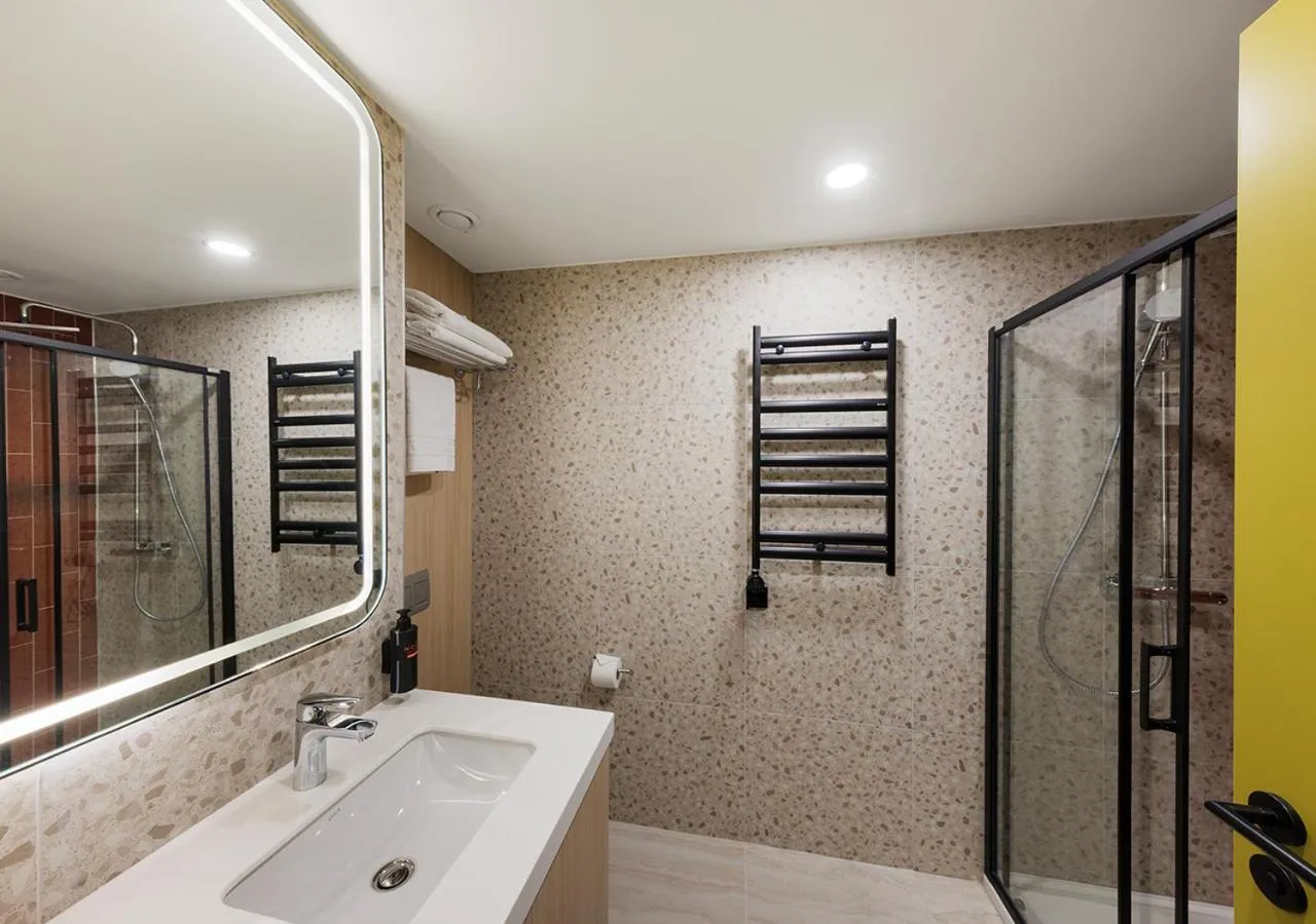 Shower in Noém Hotel