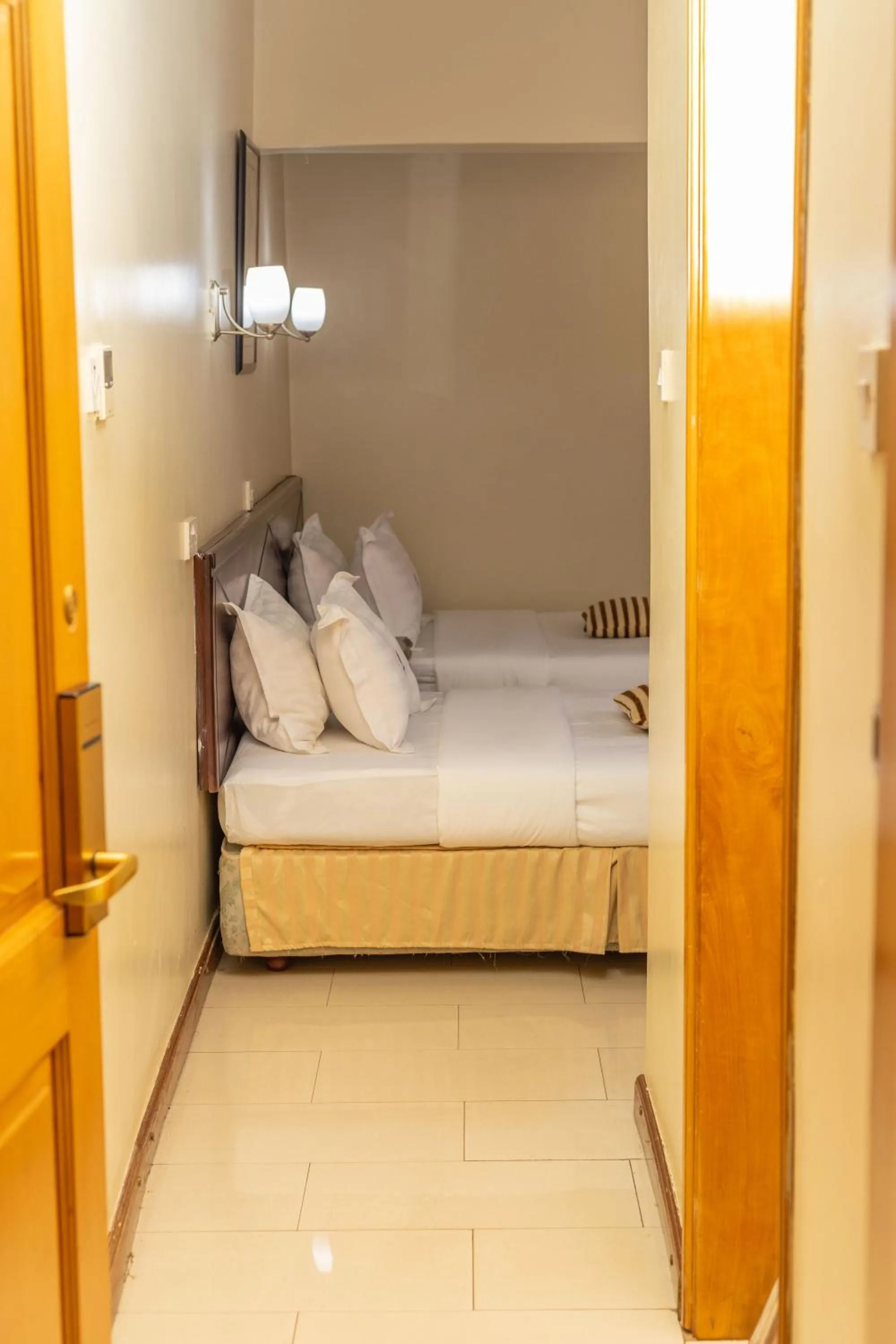 Bed in Holiday Express Hotel Kampala