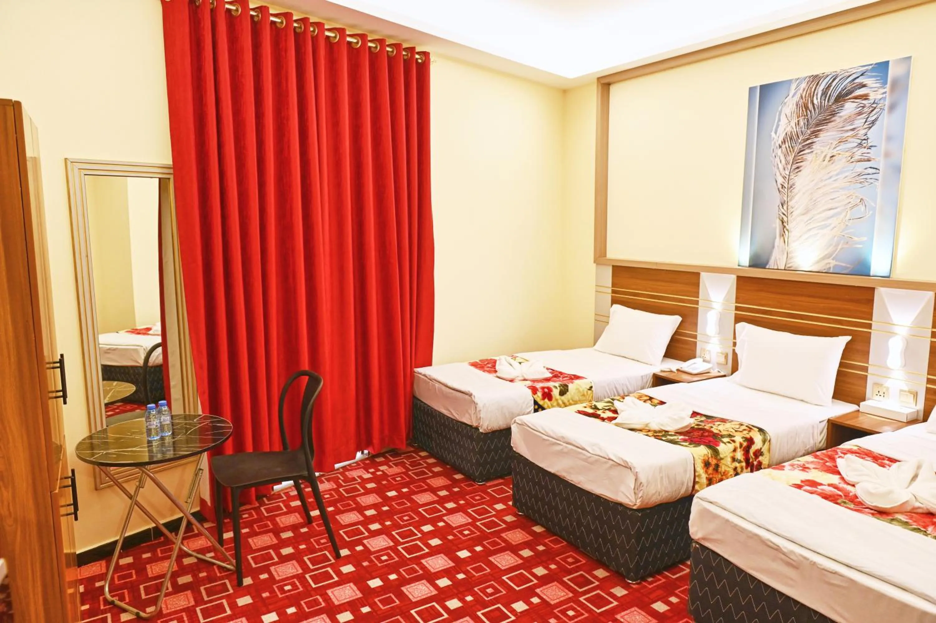 Bed in Tanha Palace Hotel