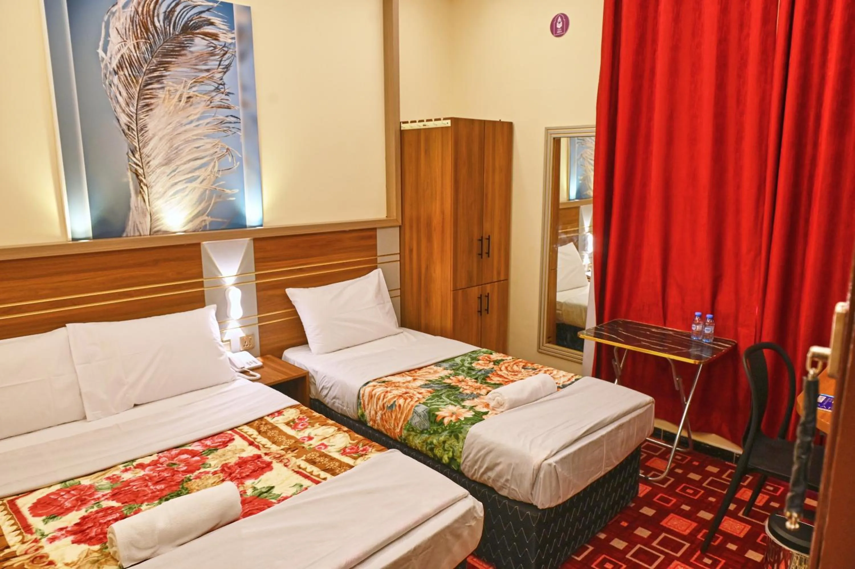 Bed in Tanha Palace Hotel