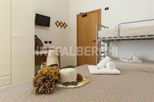 Bedroom in Hotel La Pergola