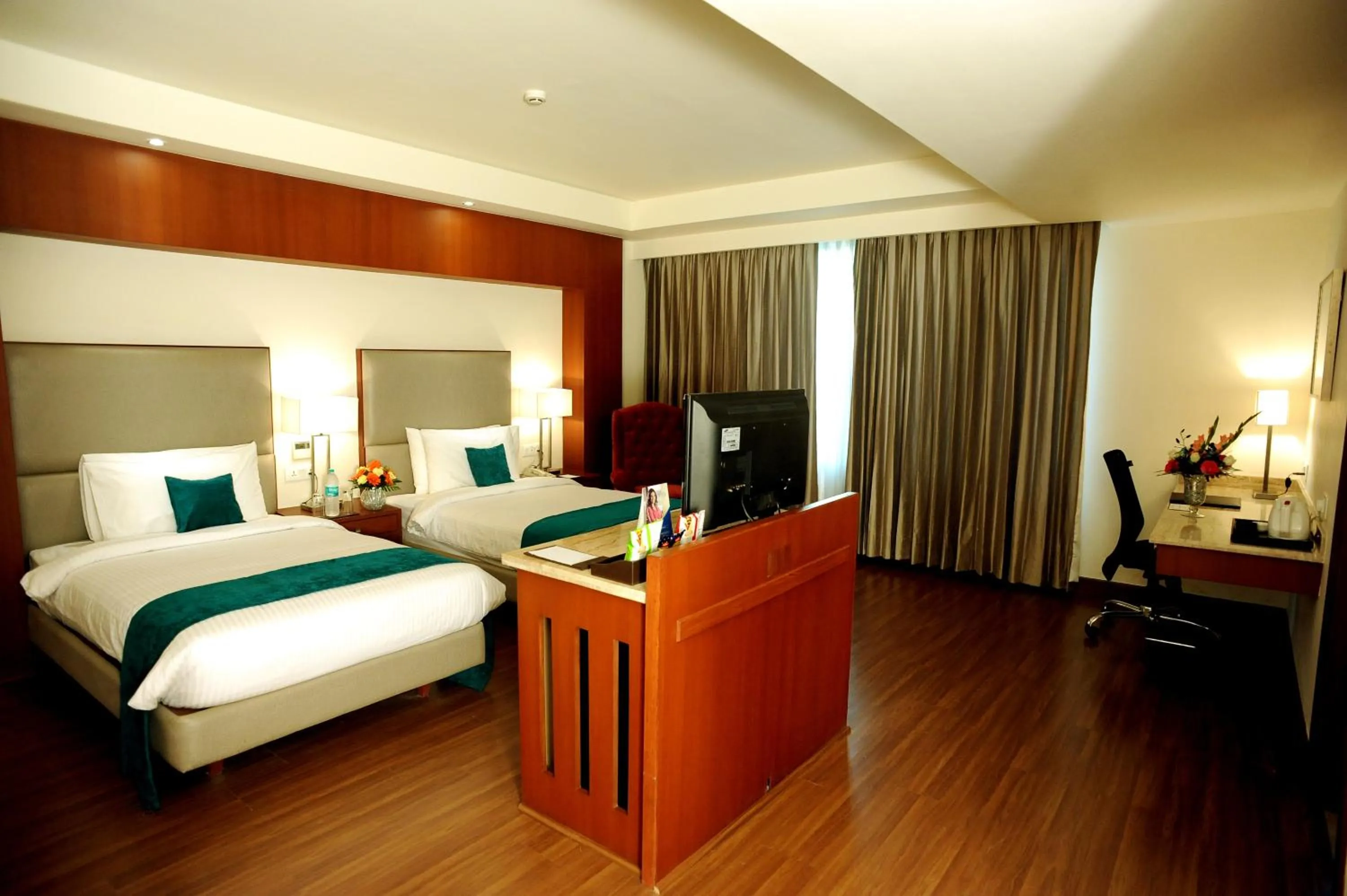 Bedroom, Bed in Sarovar Portico- Jalandhar
