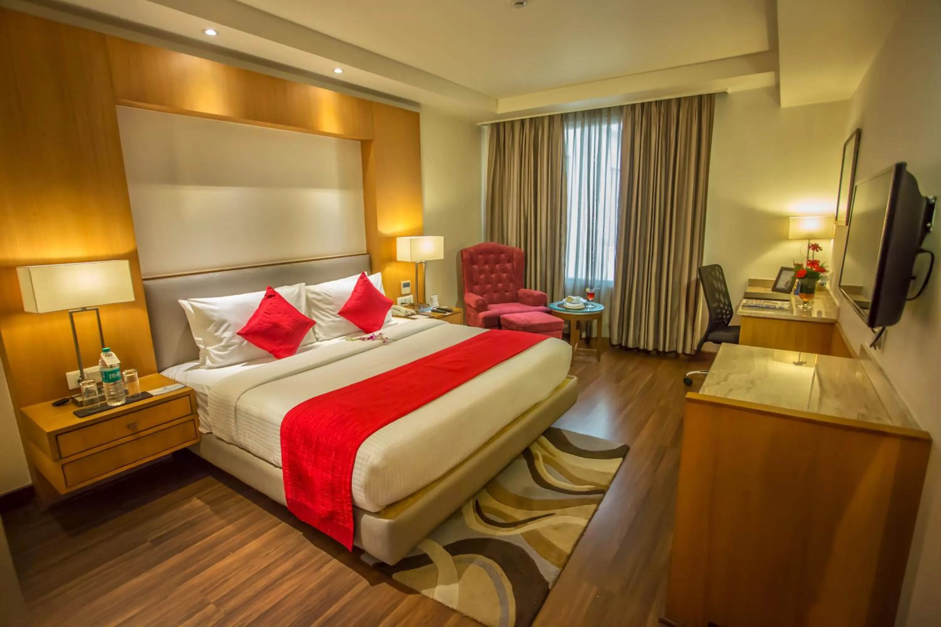 Photo of the whole room, Bed in Sarovar Portico- Jalandhar