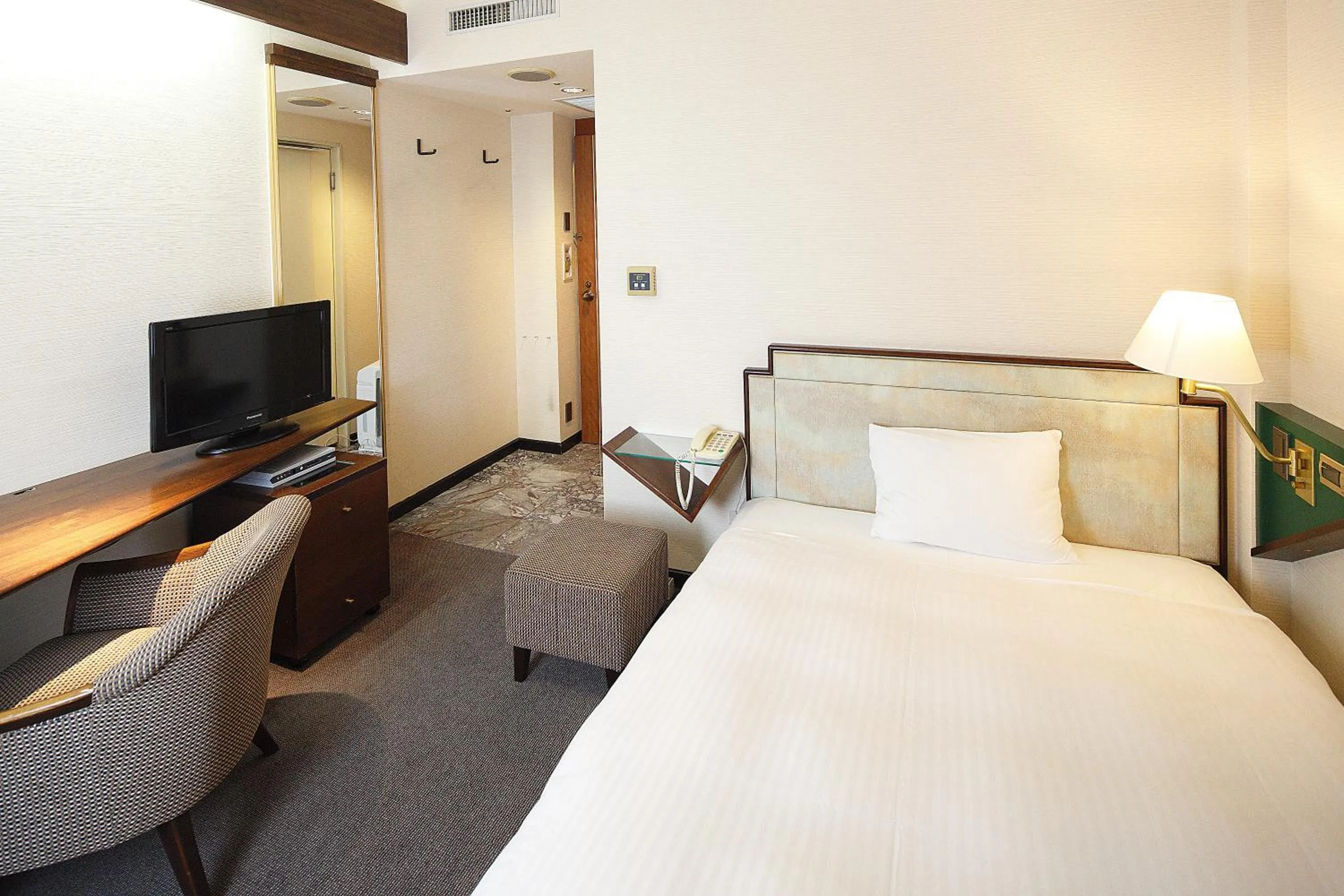 Bed in Hotel New Omi