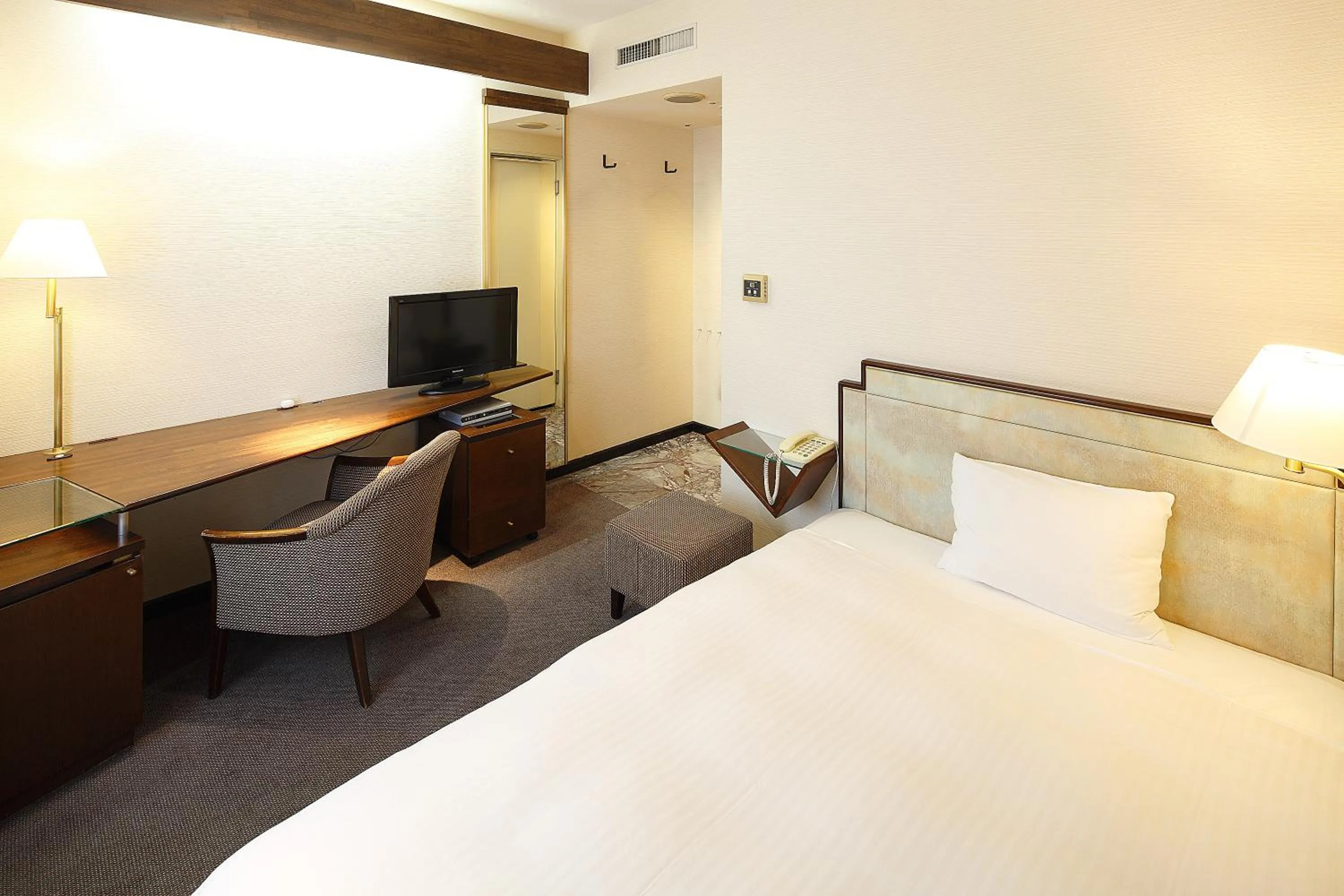 Bed in Hotel New Omi