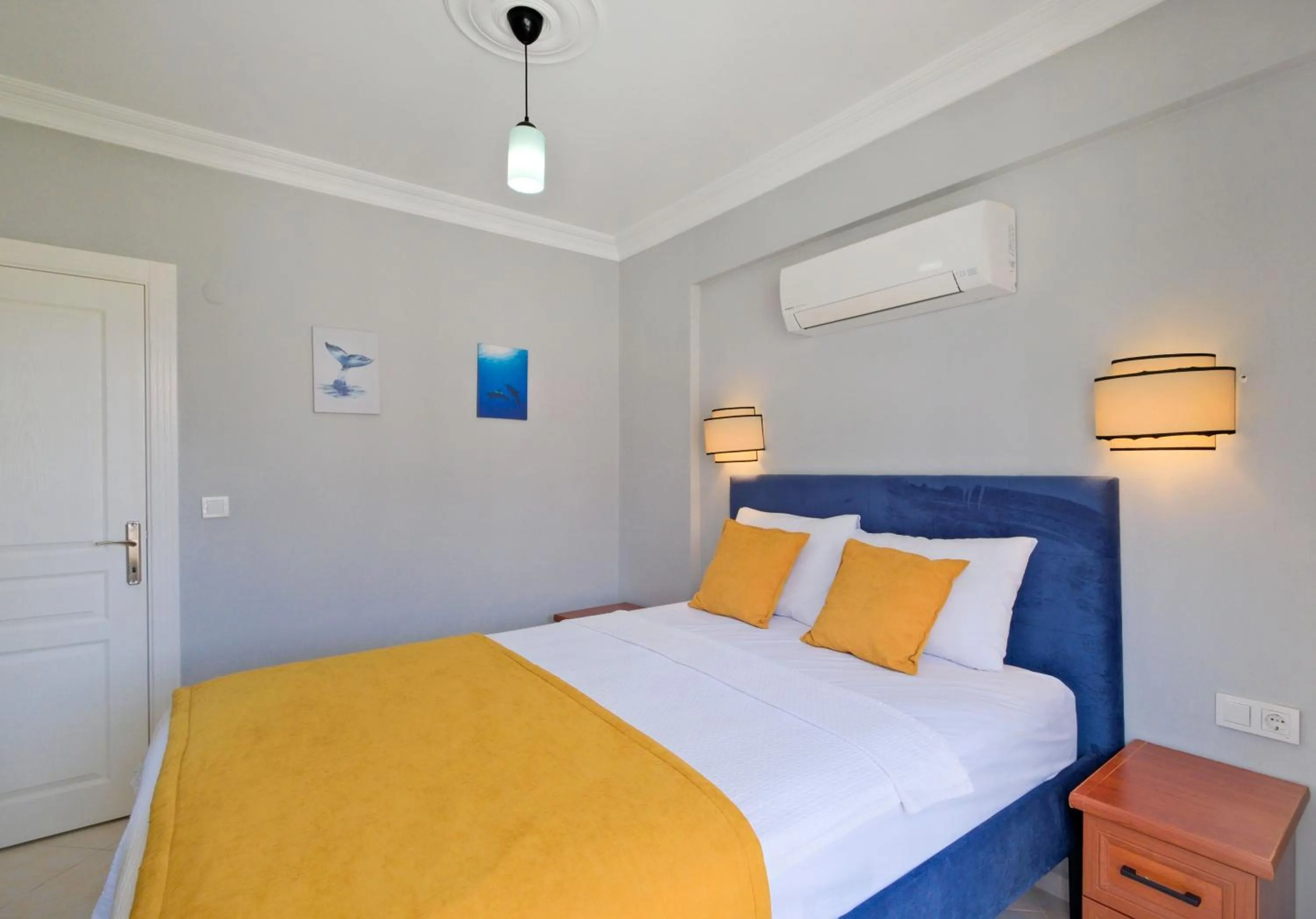 Bed in Gold Lion Apart Hotel