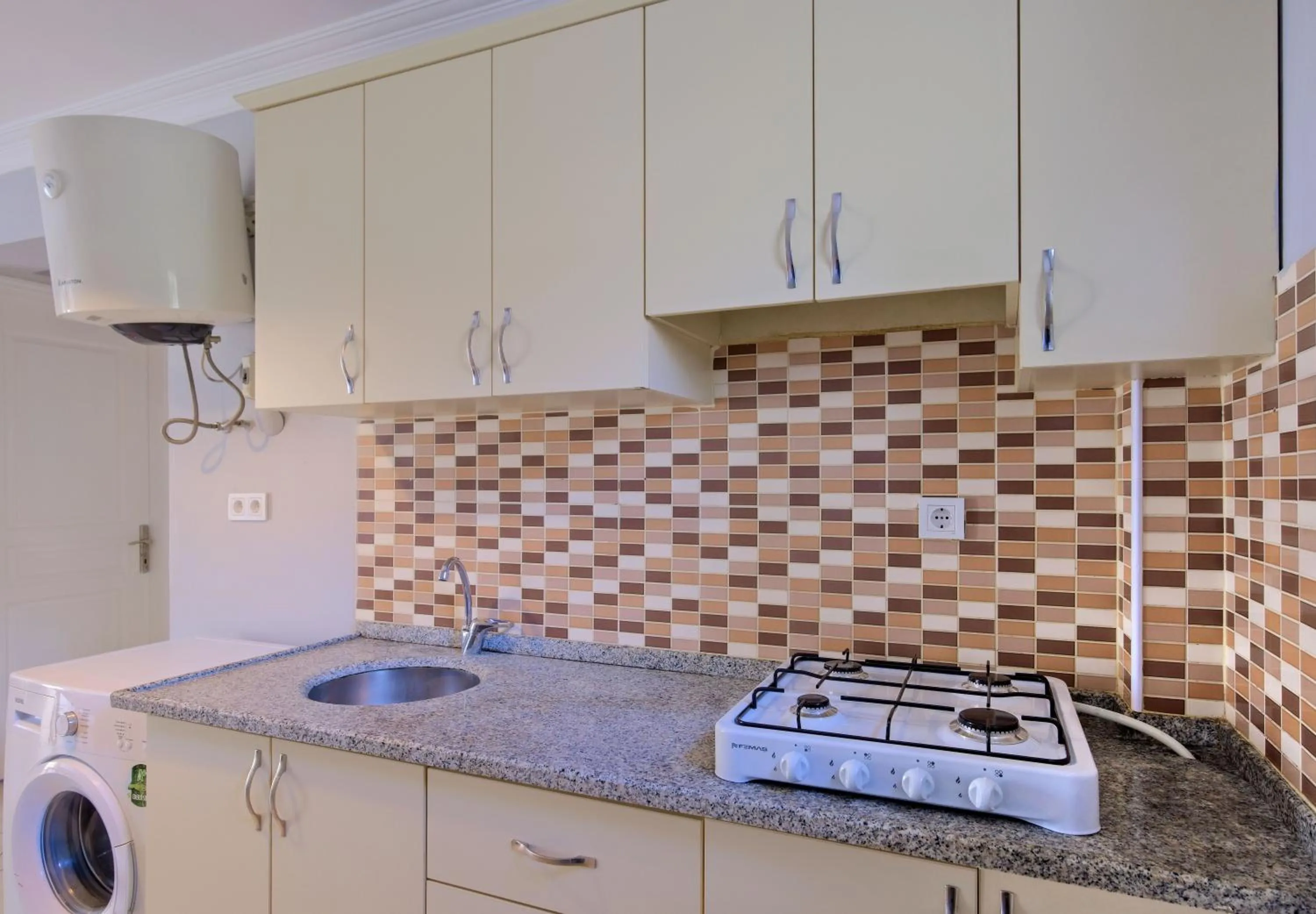 Kitchen or kitchenette in Gold Lion Apart Hotel