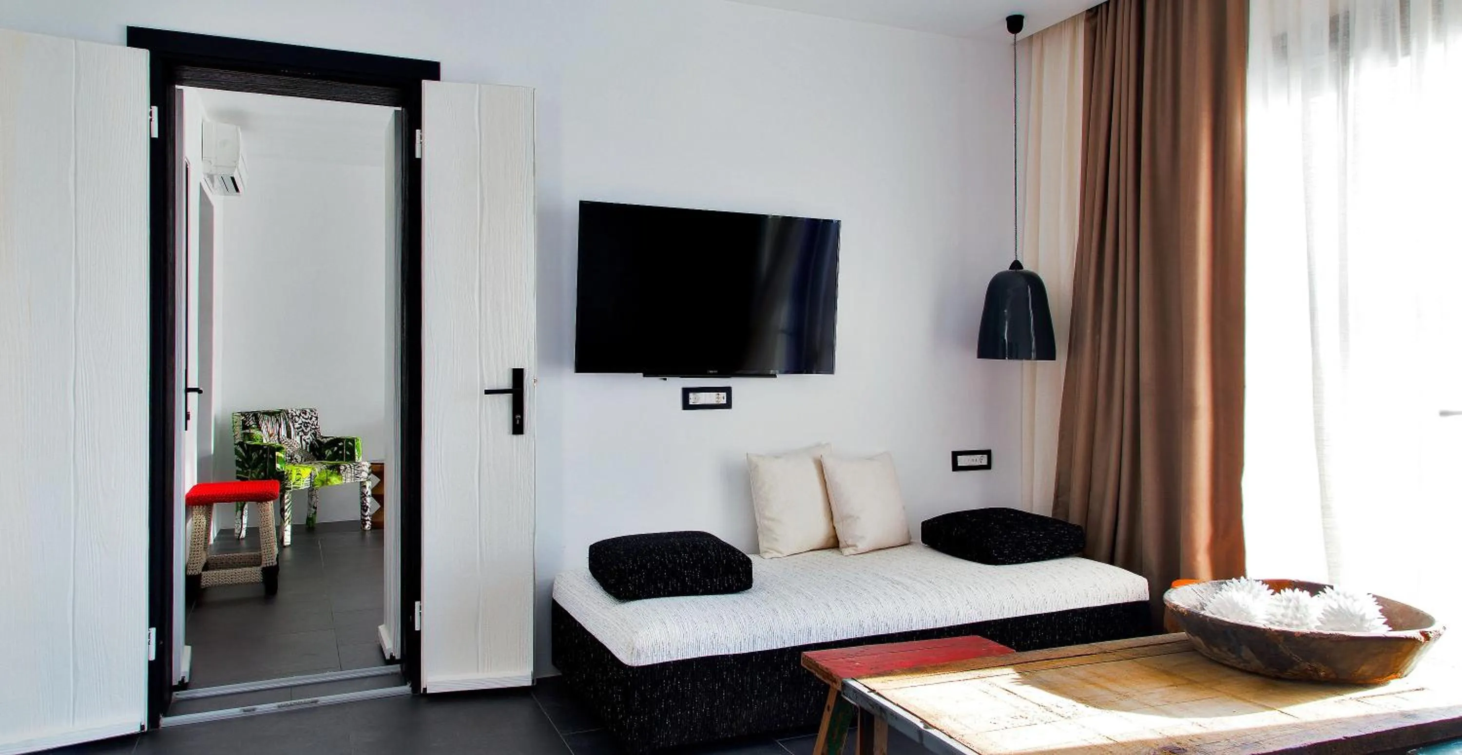 TV and multimedia, Bed in Myconian Avaton, a Member of Design Hotels